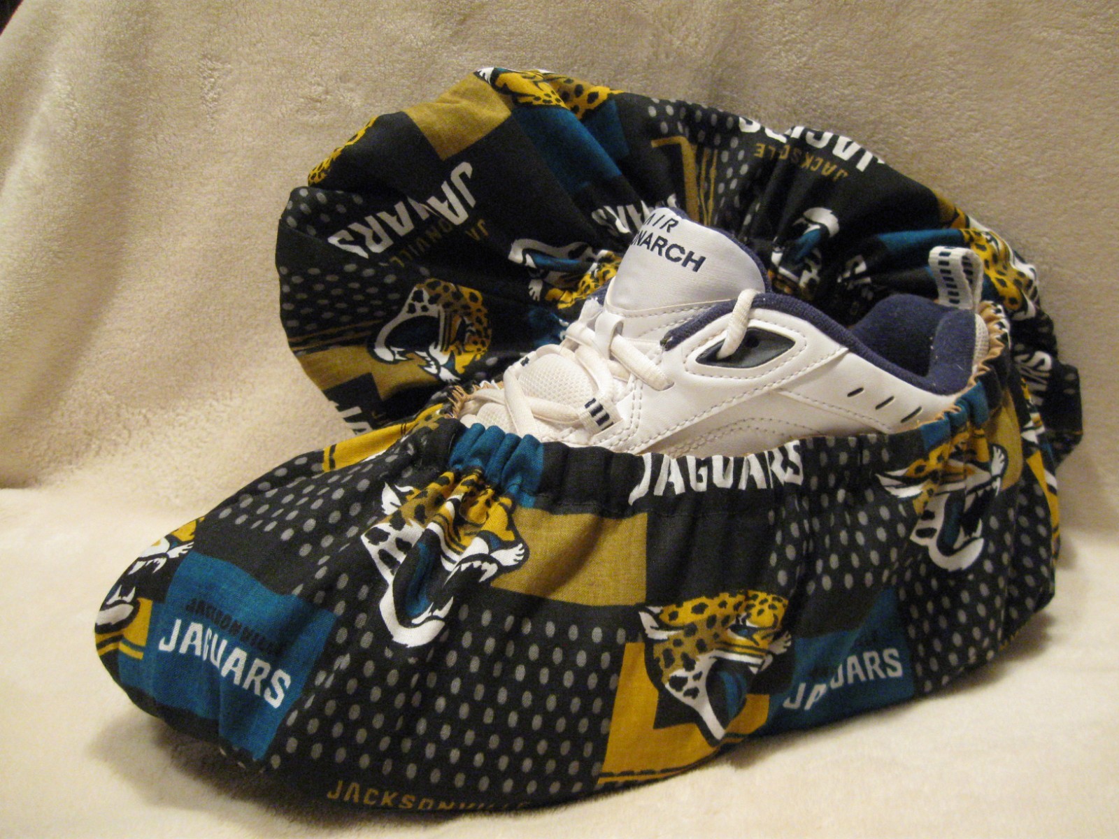 Jacksonville Jaguars bowling shoe covers. Handmade, Cotton, Lined ,Vinyl soles.