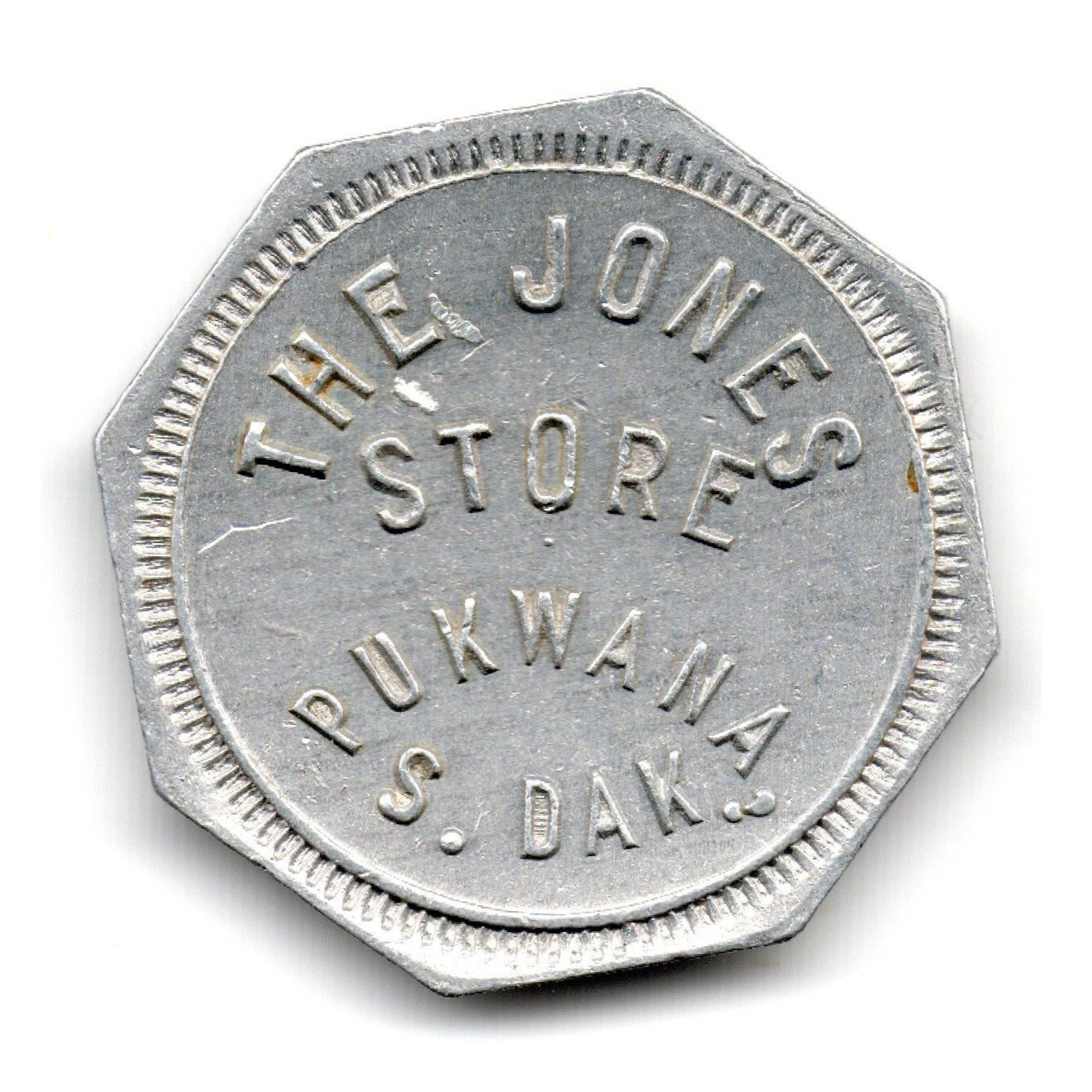 THE JONES STORE • GOOD FOR 10¢ IN MERCHANDISE • PUKWANA, S.DAK. • TC-116956