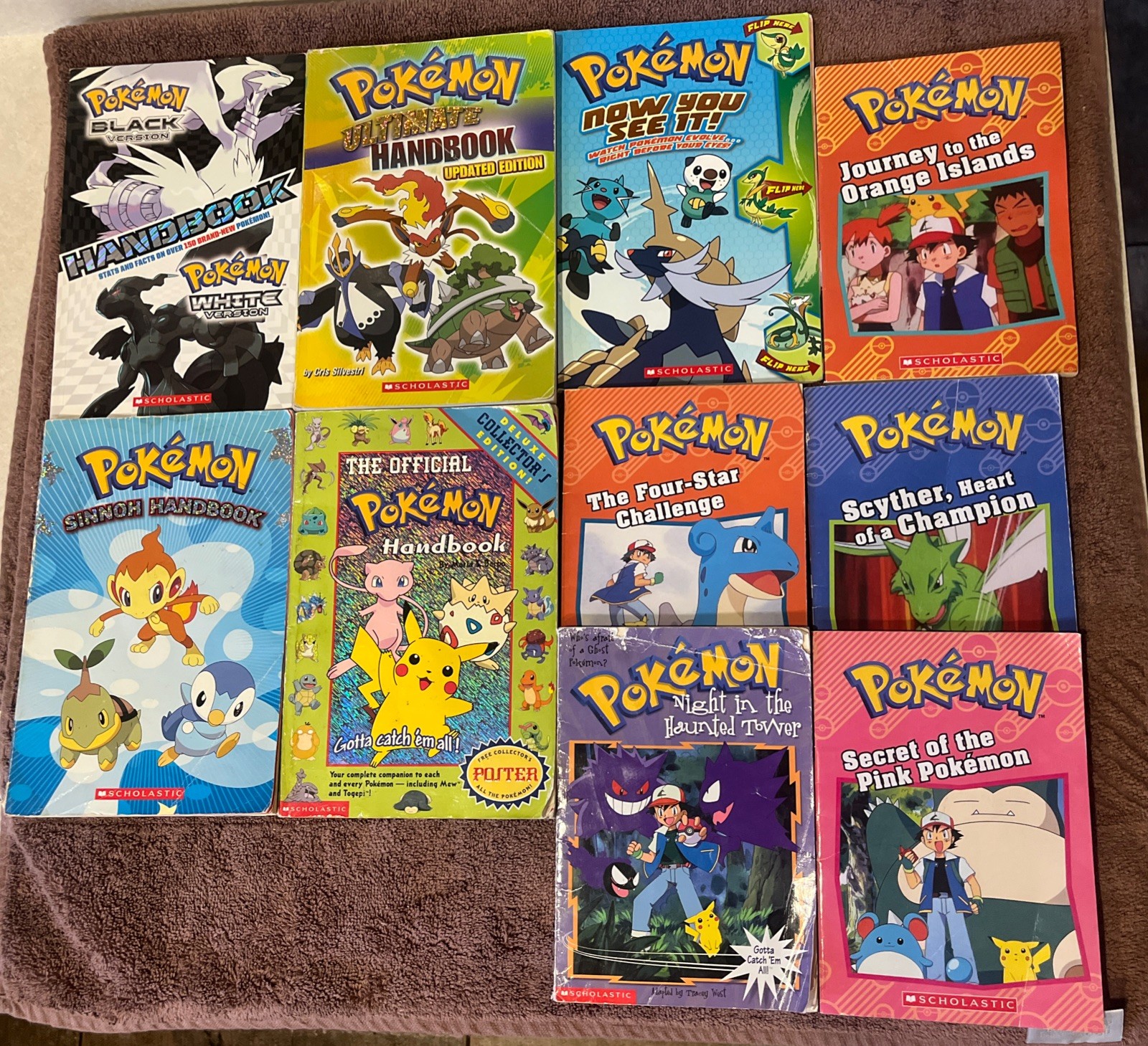 Lot of 10 Pokemon Paperback Handbooks - Ultimate, Sinnoh, Black Version + More