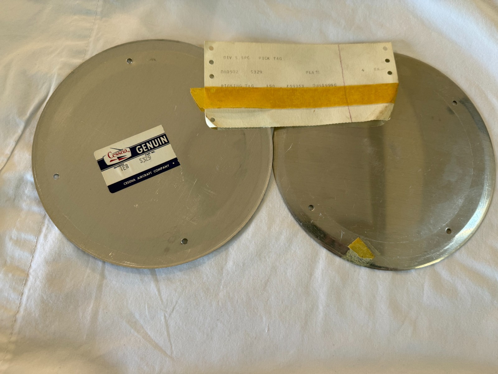 New Cessna wheel cover pair P/N  S329, with pick tag