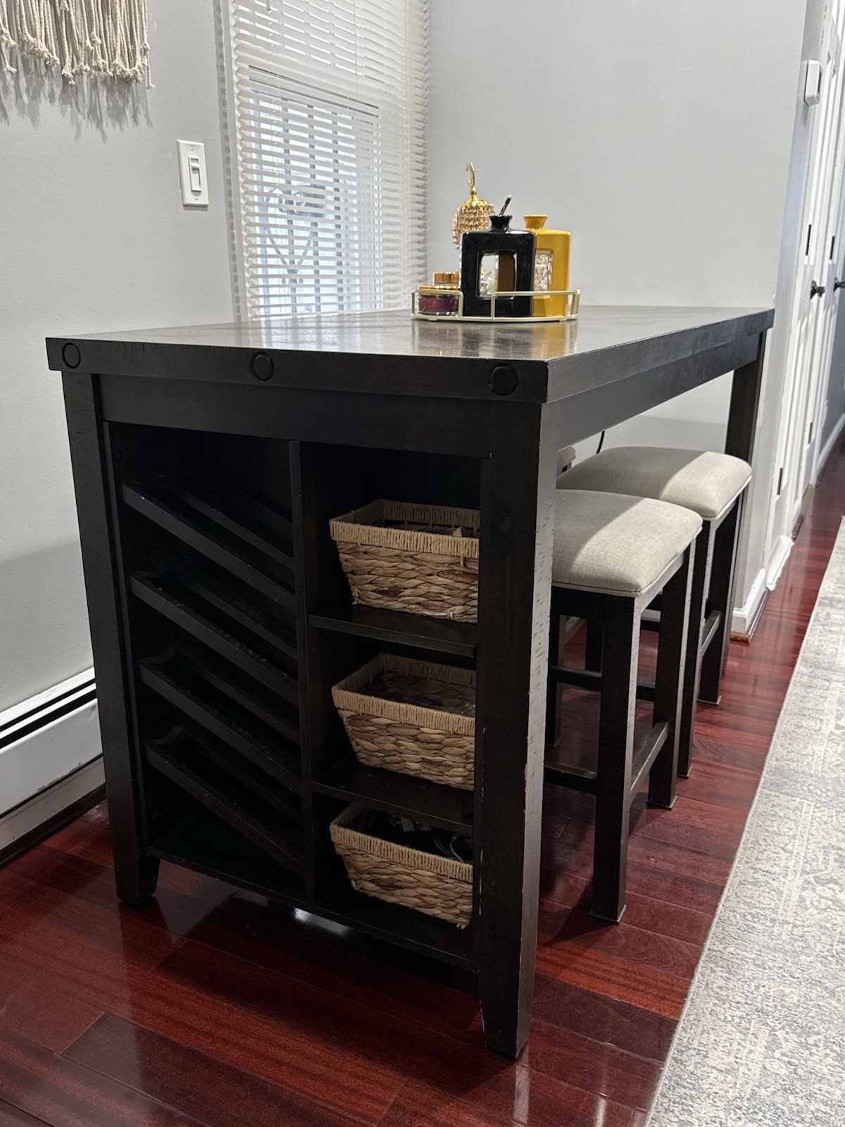 Dark wood 5-piece dining set with storage and stools