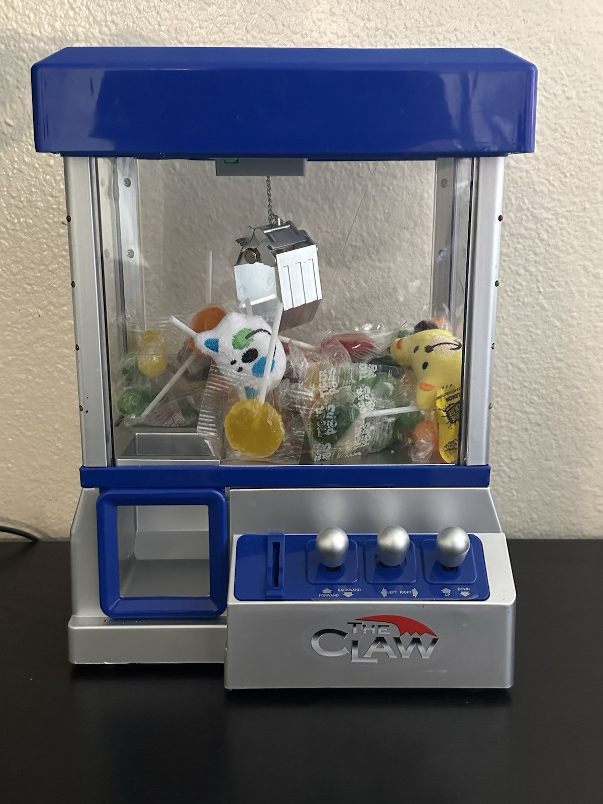 The Claw Electronic Claw Machine Game Blue Silver Tabletop Toy