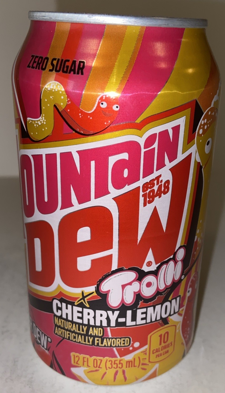 12oz. MTN DEW CAN ( TROLLI est 1948 ) EMPTY BOTTOM OPENED