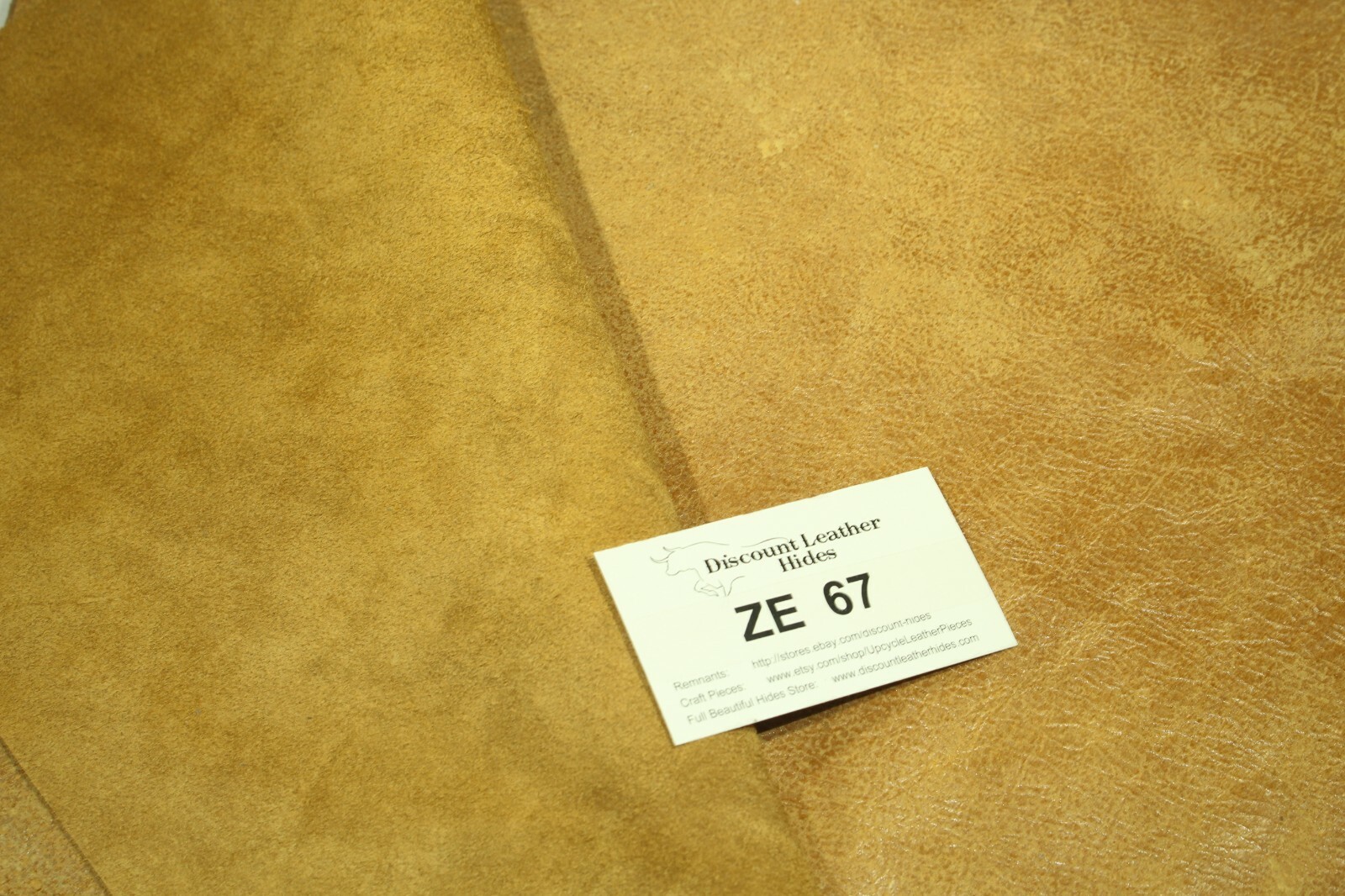 Rough and scratchy outside finish. Tan. Completely different feel! ZE67