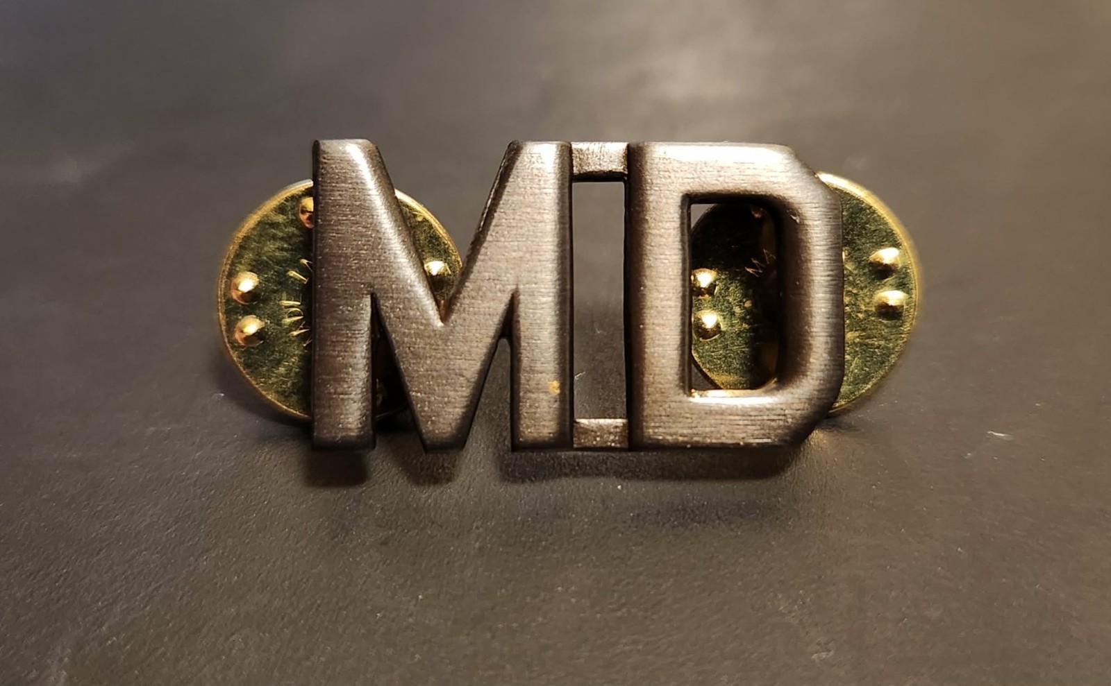 Subdued "MD" Black/Grey Metal Finish Uniform Pin - 1 Inch - NEW