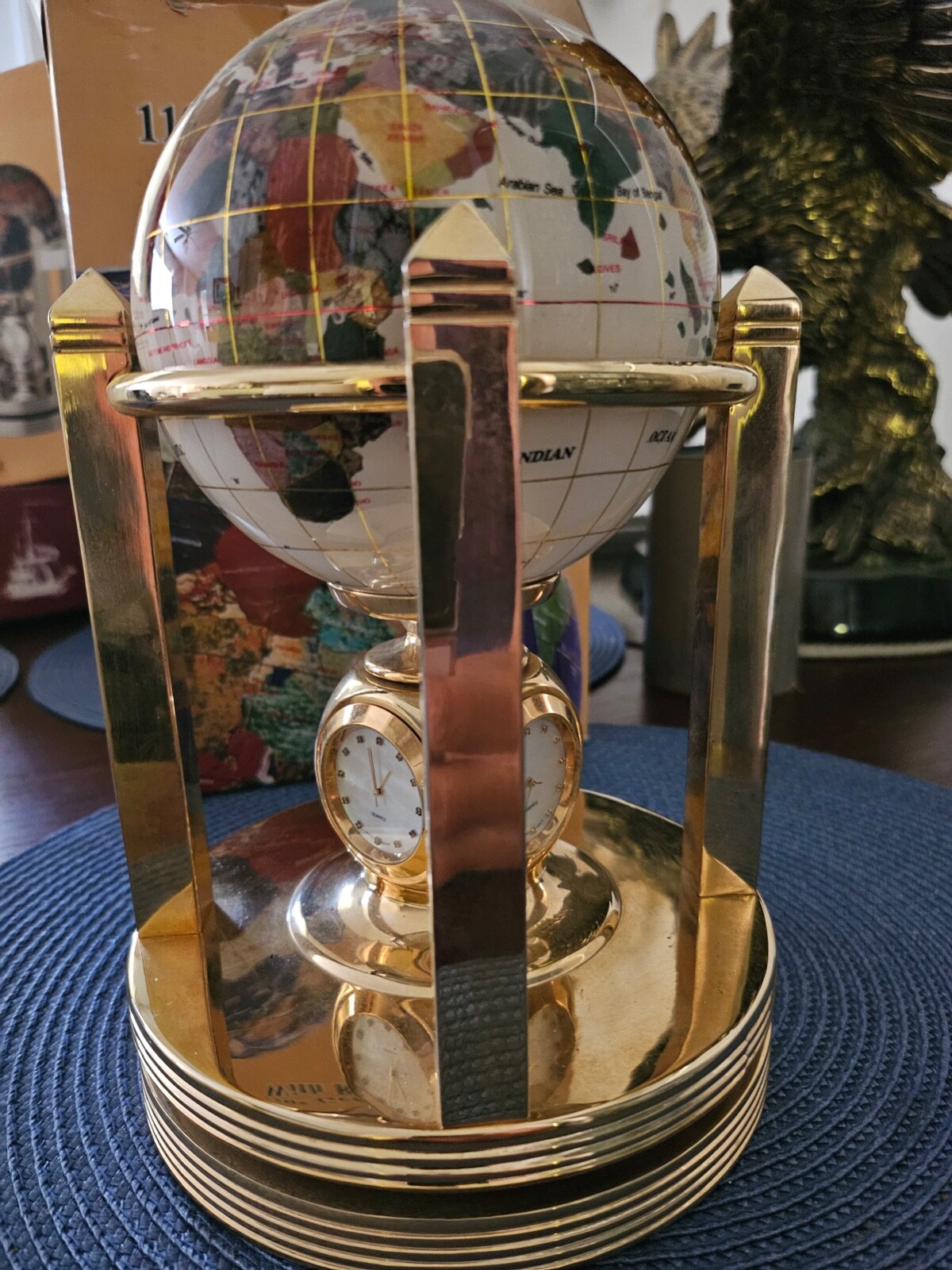 Semi precious gemstone globe, rotating w/3 clocks + 1 Thermometer