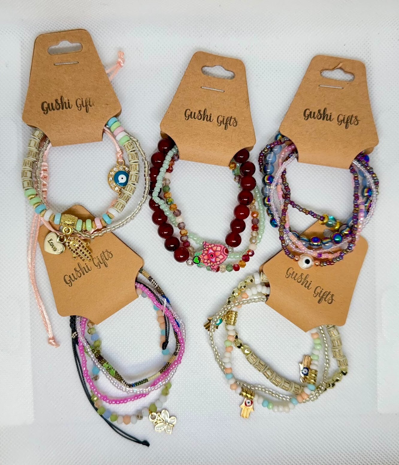 5 Sets of Handmade Beaded Bracelets with Charms