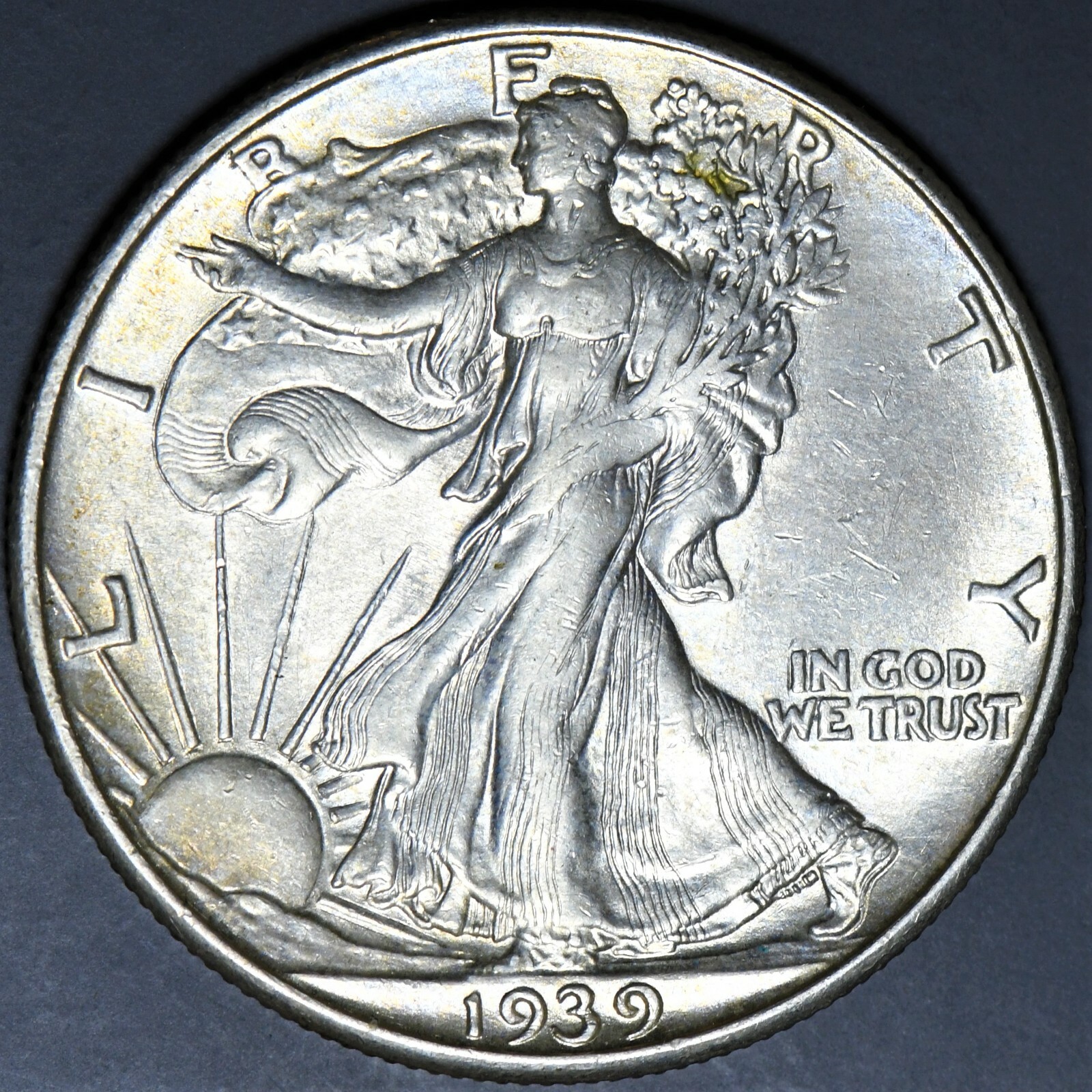 1939 d Walking Liberty Half Dollar, a beautiful half dollar in a high grade.