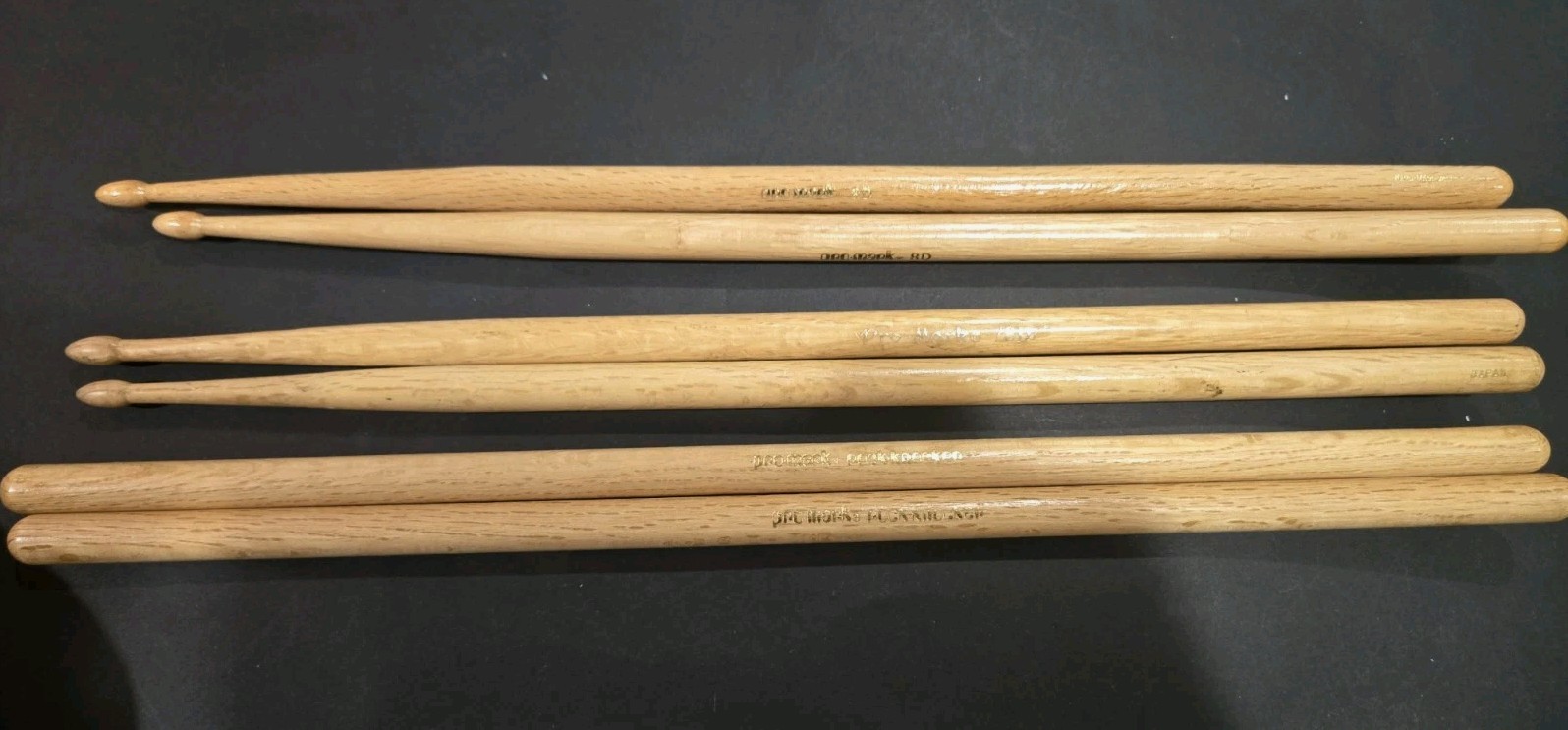 3 PAIRS  OF VTG PRO MARK DRUM STICKS KNOCKERS, TWO PAIRS OF 8D MADE OF OAK WOOD