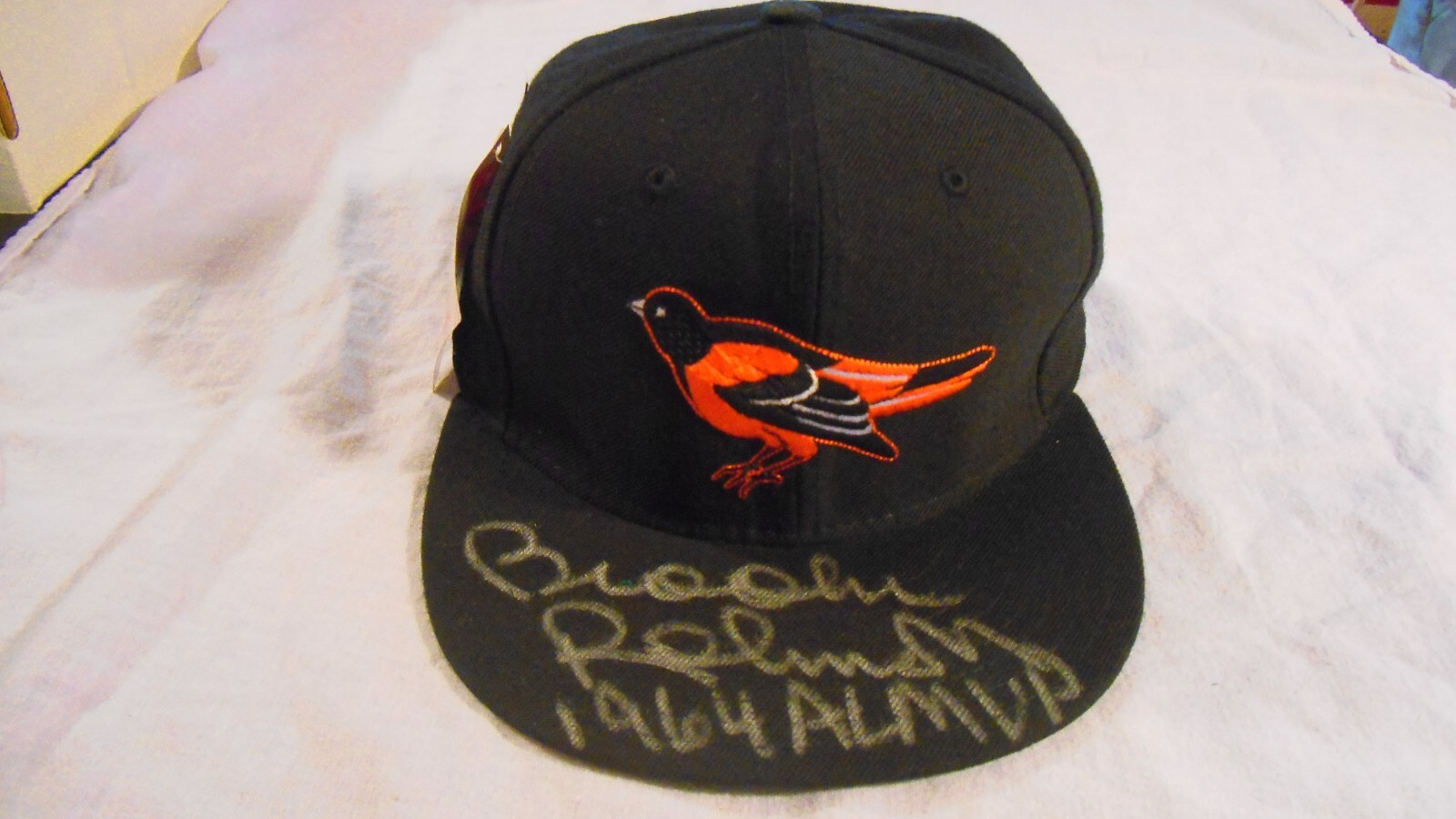 Brooks Robinsons Auto W/Inscr. 1964 AL MVP Baltimore Orioles Cap MLB Diamond Col