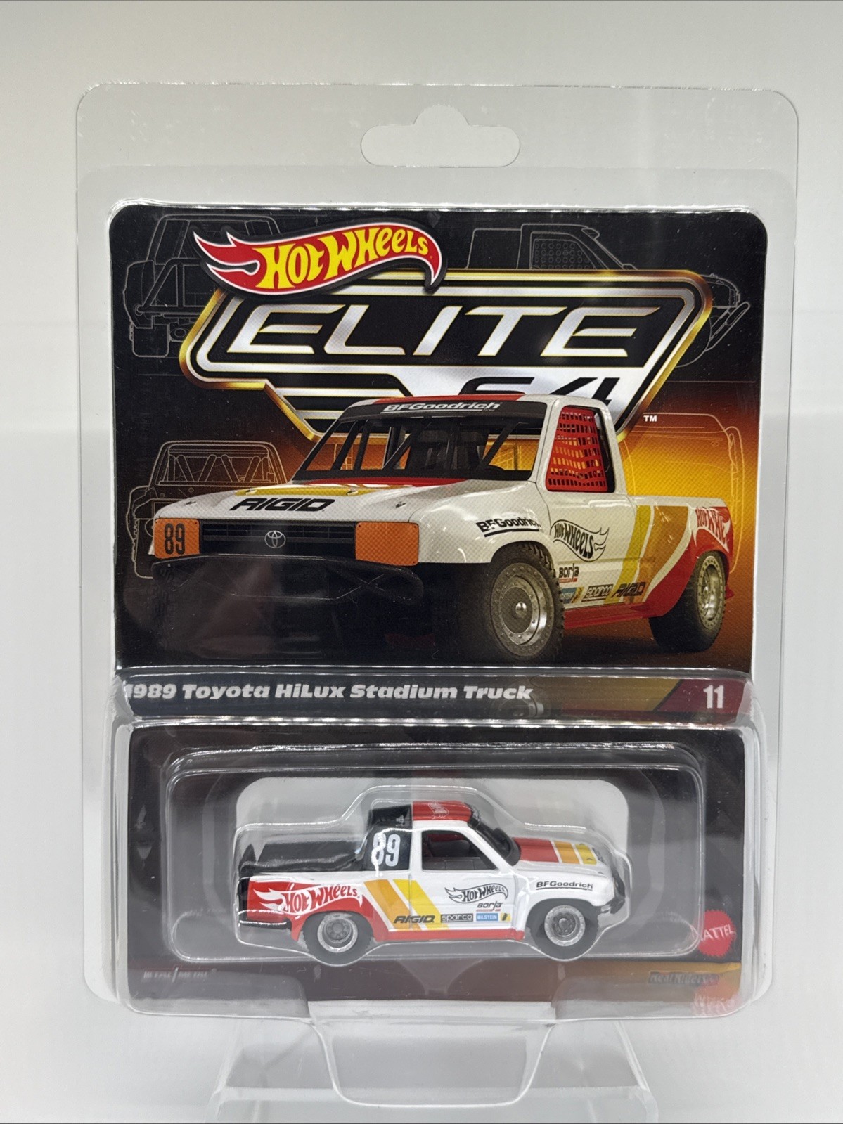 Hot Wheels Elite 64 #11 1989 Toyota HiLux Stadium Truck White 1:64 Diecast HWR90