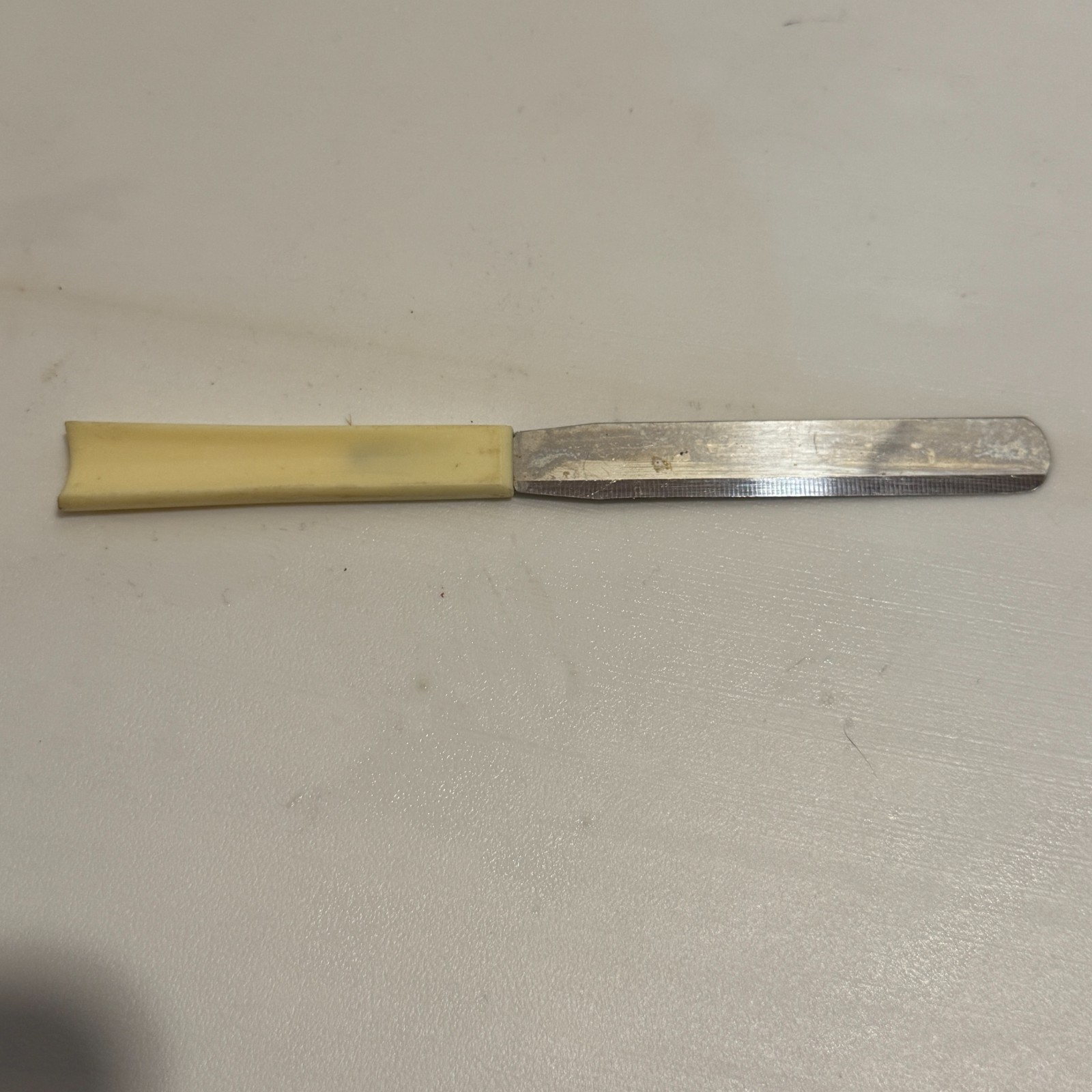 Vintage Quikut Butter Knife with Plastic Handle
