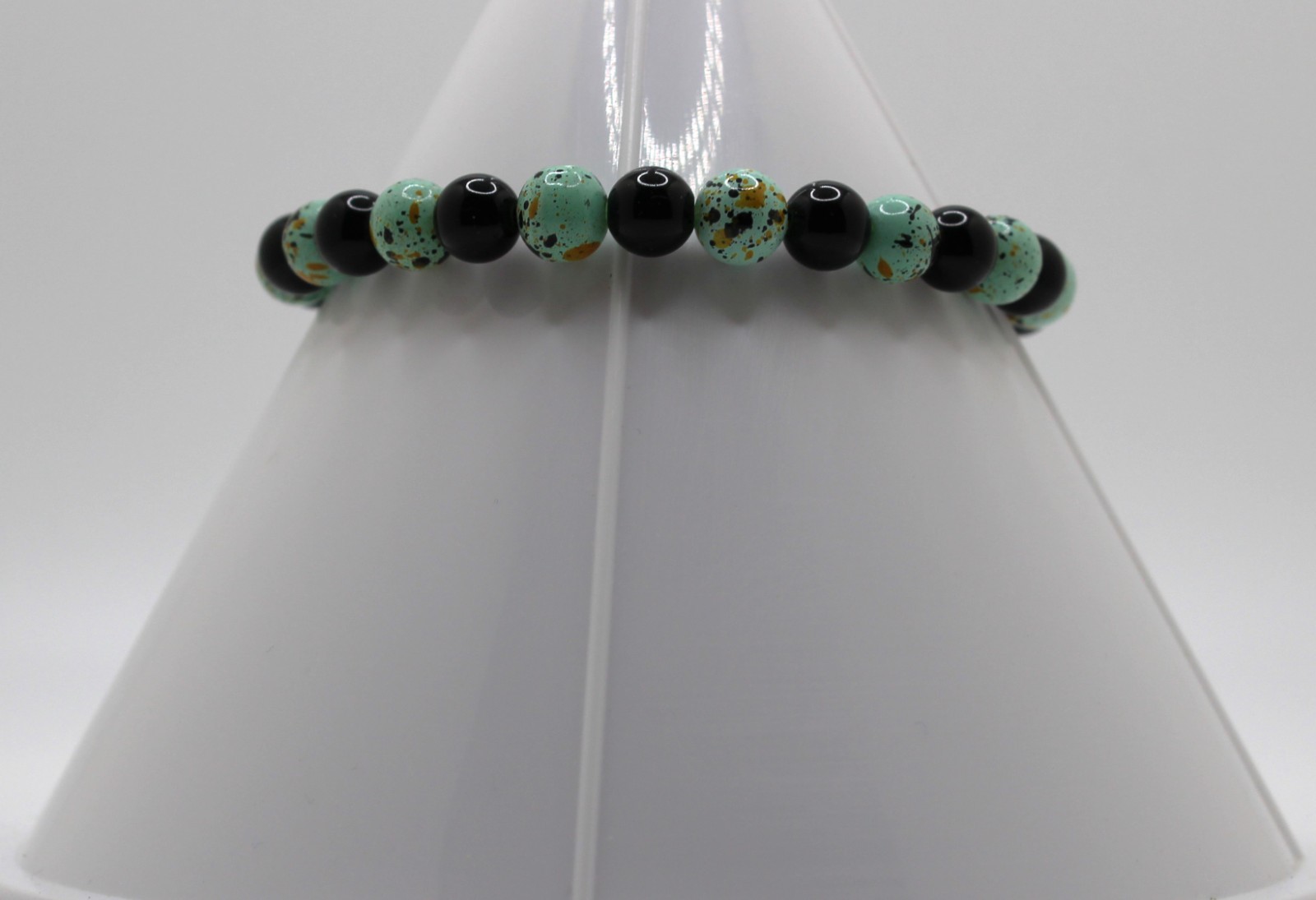 Handcrafted 8.5" black and green speckled glass beads bracelet