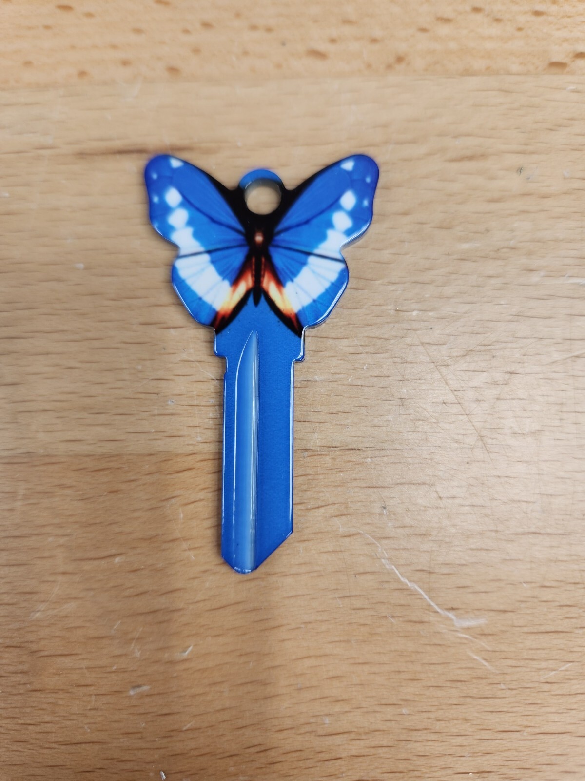 BLUE COLORED BUTTERFLY SHAPED SCHLAGE SC1 KEYBLANK - READ DETAILS BELOW