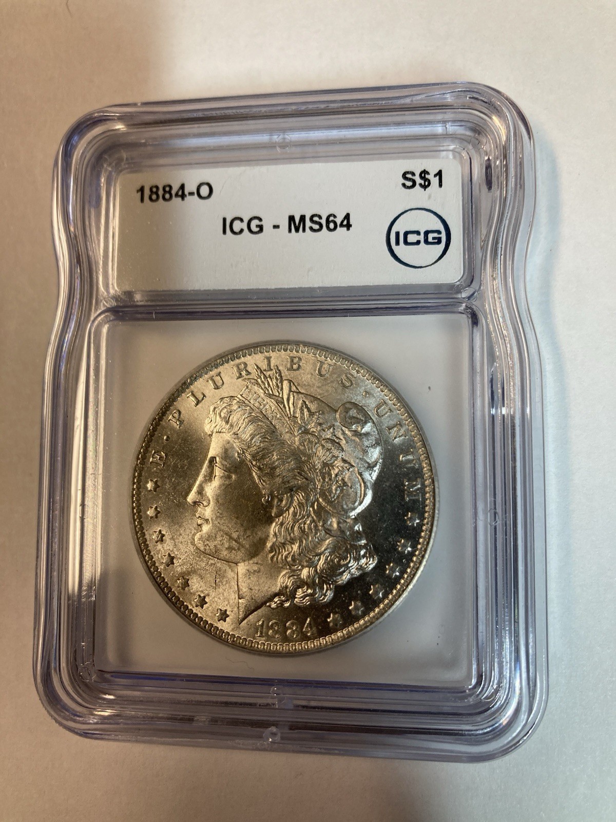 Flashy 1884-O ICG Morgan Silver Dollar MS 64