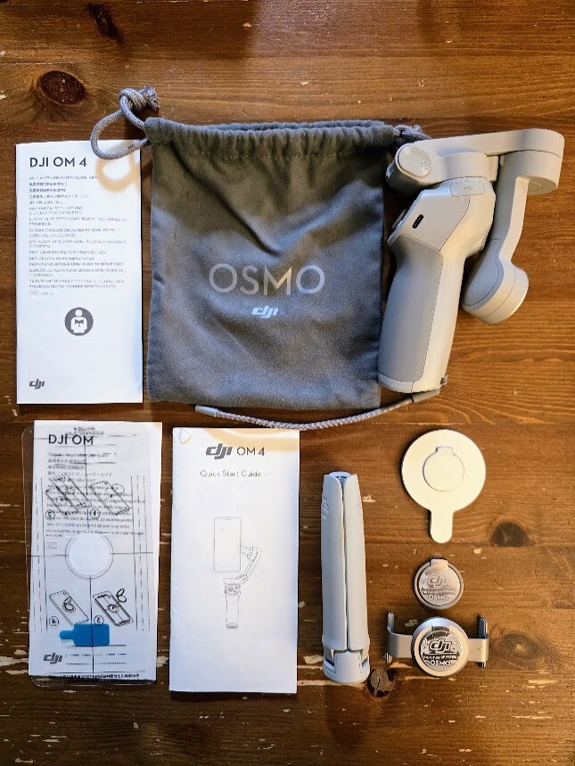 DJI OM 4 - Handheld 3-Axis Smartphone Gimbal  w/ Magnetic Phone Holder Clamp