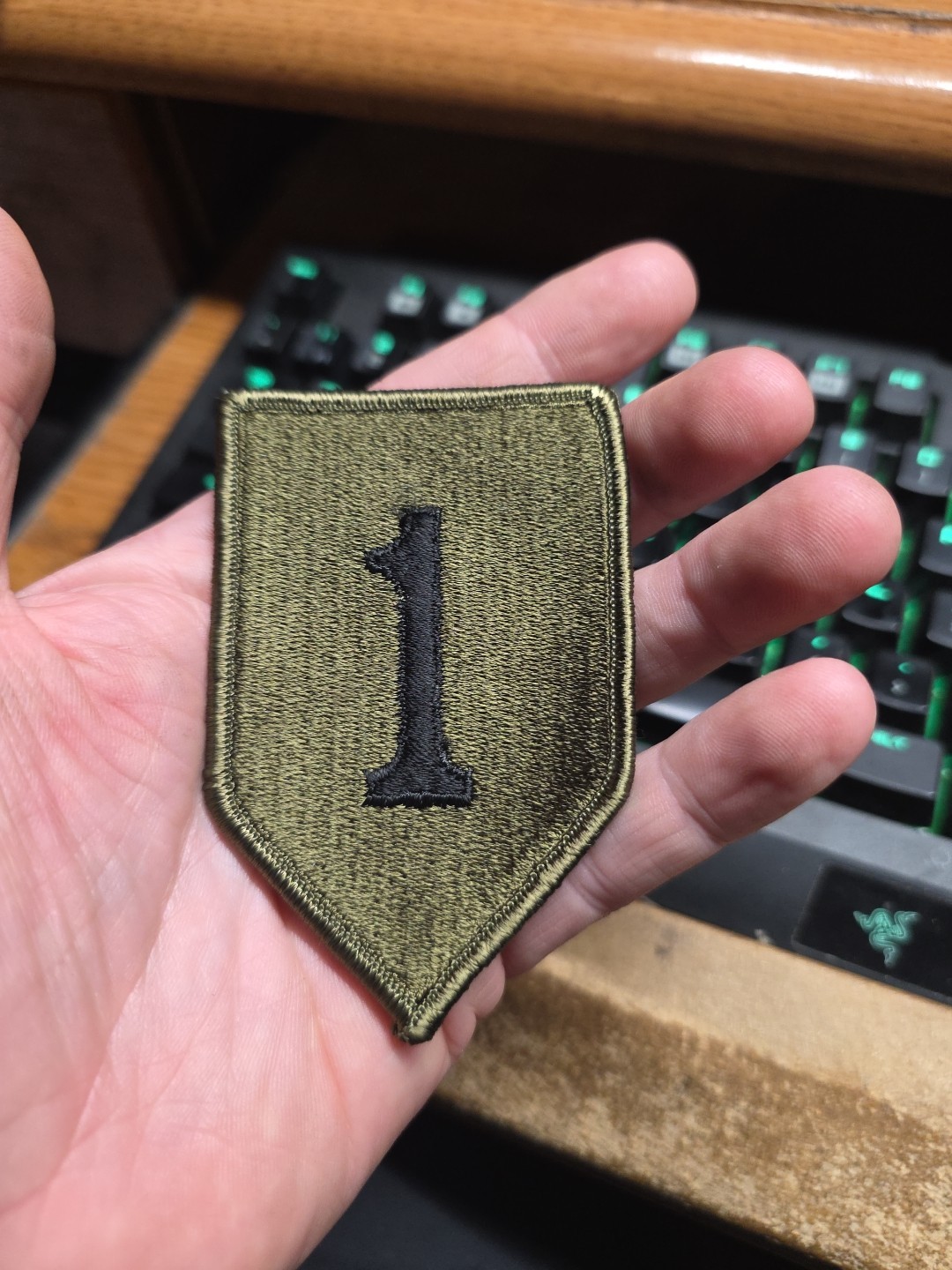 United States Army First 1st Infantry Division Subdued OD Green Black Patch NOS