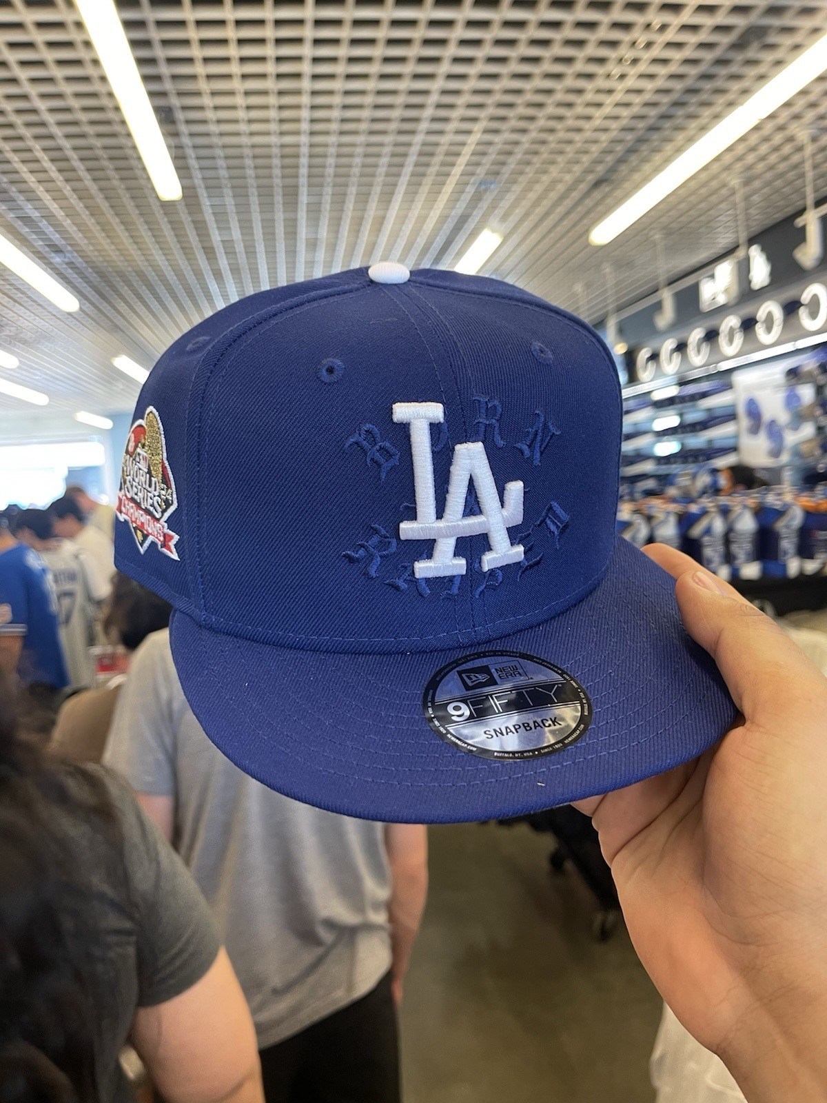 NEW ERA BORN X RAISED + DODGERS 2024 WORLD SERIES SNAPBACK: Blue  5/30/2025