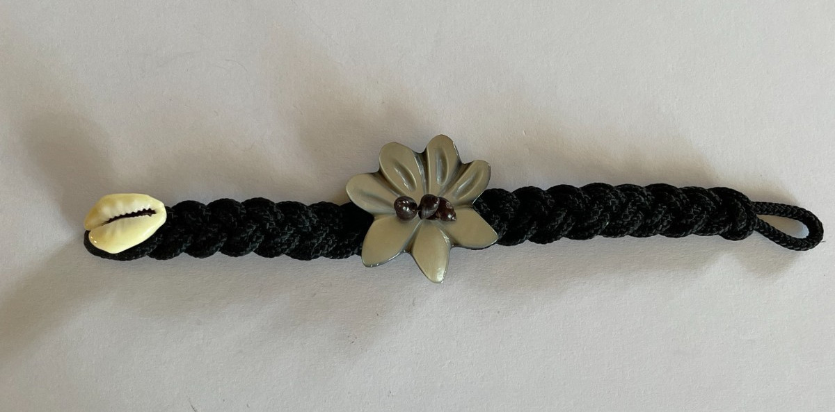 Handmade abalone shell and bead bracelet with braided cord and shell closure