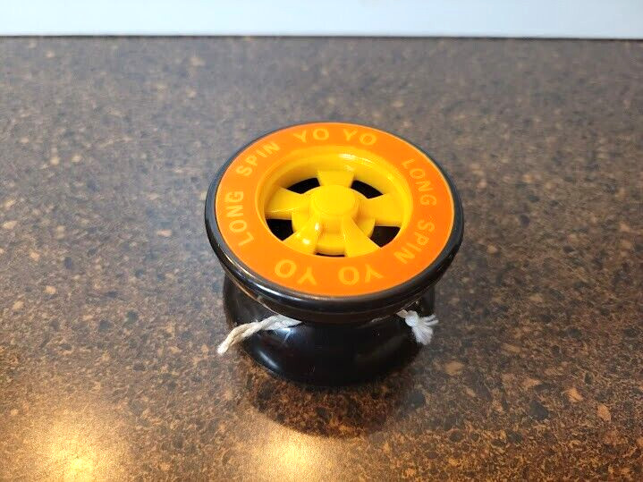 Vintage Wheels Long Spin Yo Yo