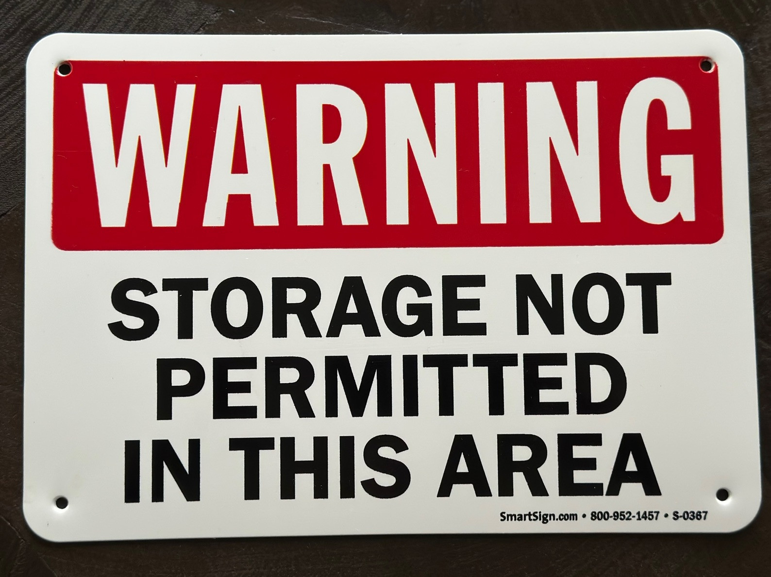 Warning Sign.  Storage Not Permitted In This Area Signs 10” x 7”.              B
