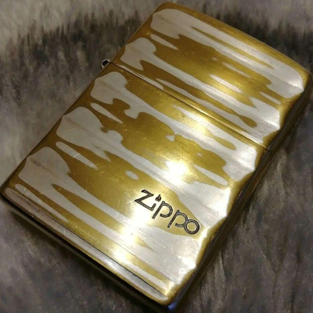 Zippo lighter, double-sided design, made in 2002.
