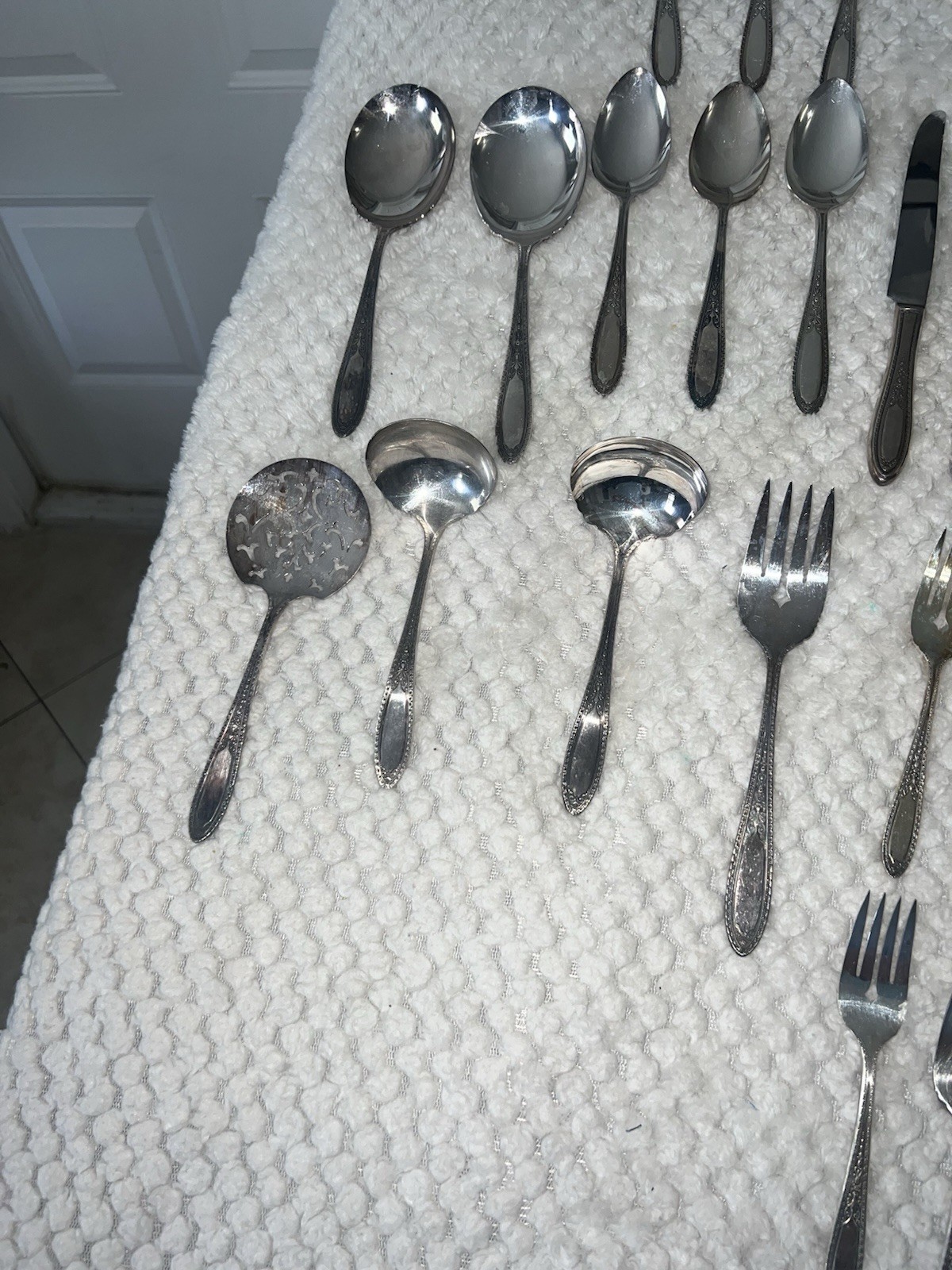 Wm. Rogers & Son or Oneida silver-plated flatware set