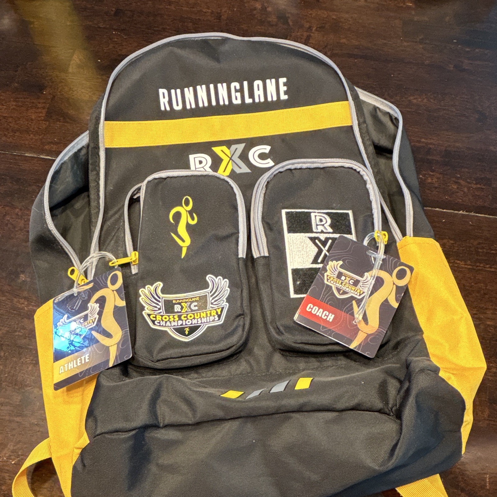 RUNNINGLANE RXC Nationals 2025 Backpack Black/Yellow Zip, Adjustable Straps