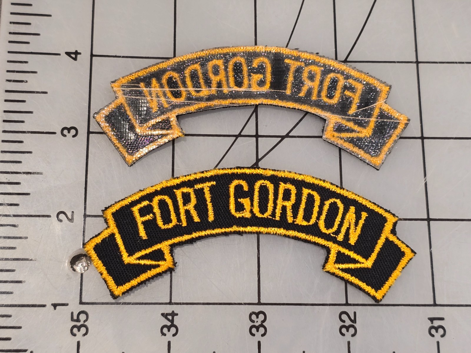 Surplus US Military Tab Fort Gordon Glue Back Cut Edge 4542