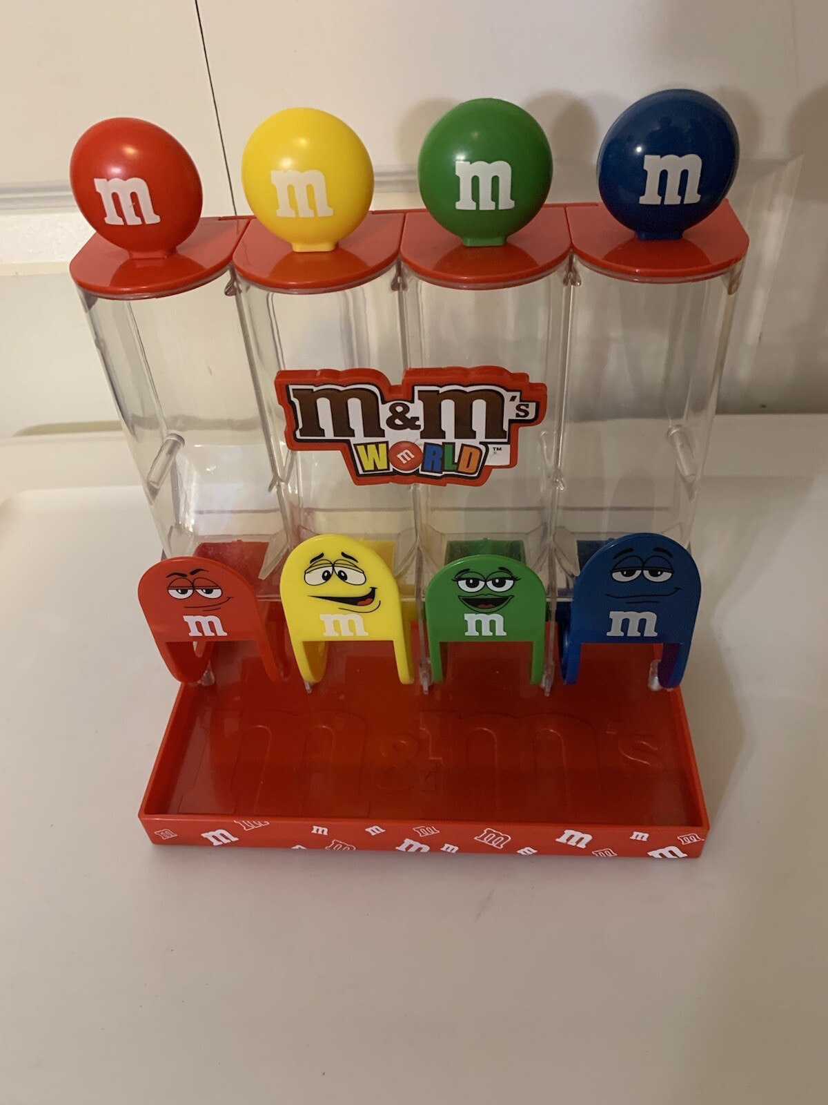 M&M's World Four Tube Red Candy Dispenser 4 colors Red, Yellow, Green, Blue
