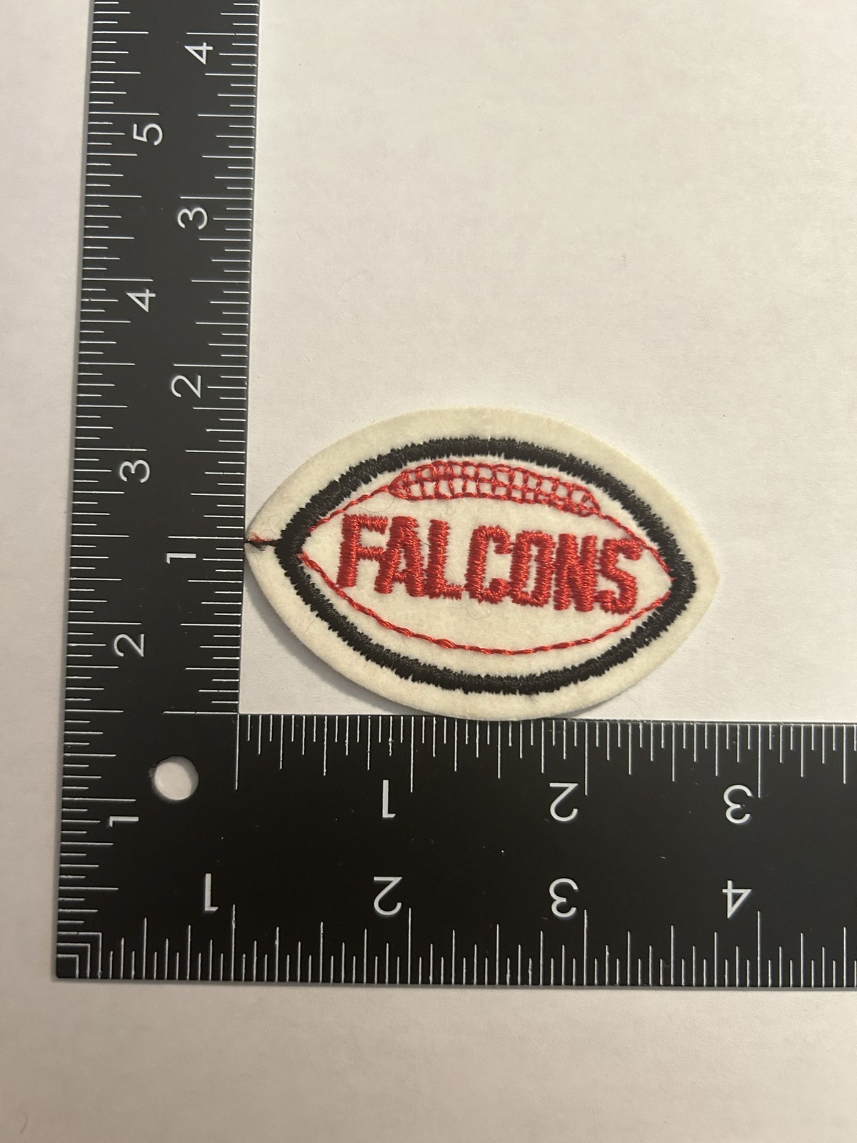 1970s VINTAGE NFL FOOTBALL SHAPED 2.75"  PATCH FALCONS RED TEXT BLACK FOOTBALL