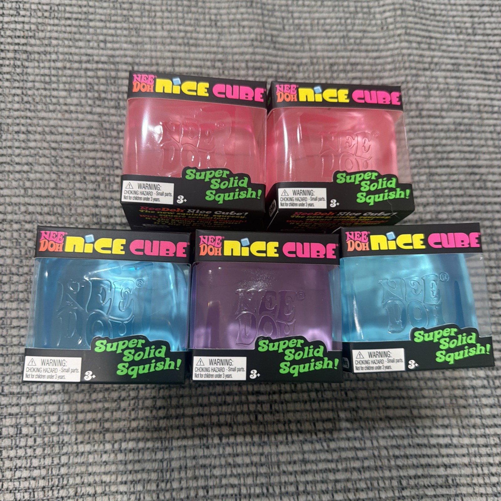 Lot OF  SCHYLLING NeeDoh Nee Doh Nice Cube Super Solid Squish Blue Purple Pink