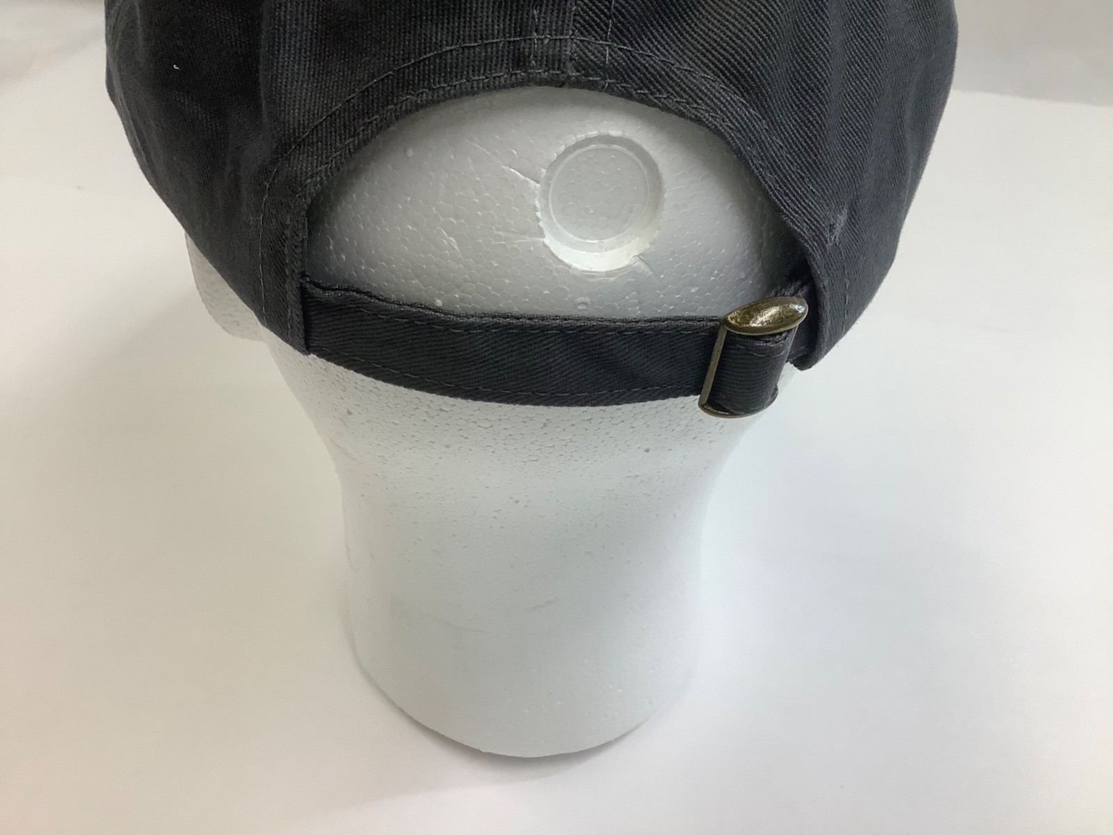 Bass Pro Shops Club Cap in dark gray with fish, adjustable to fit most people