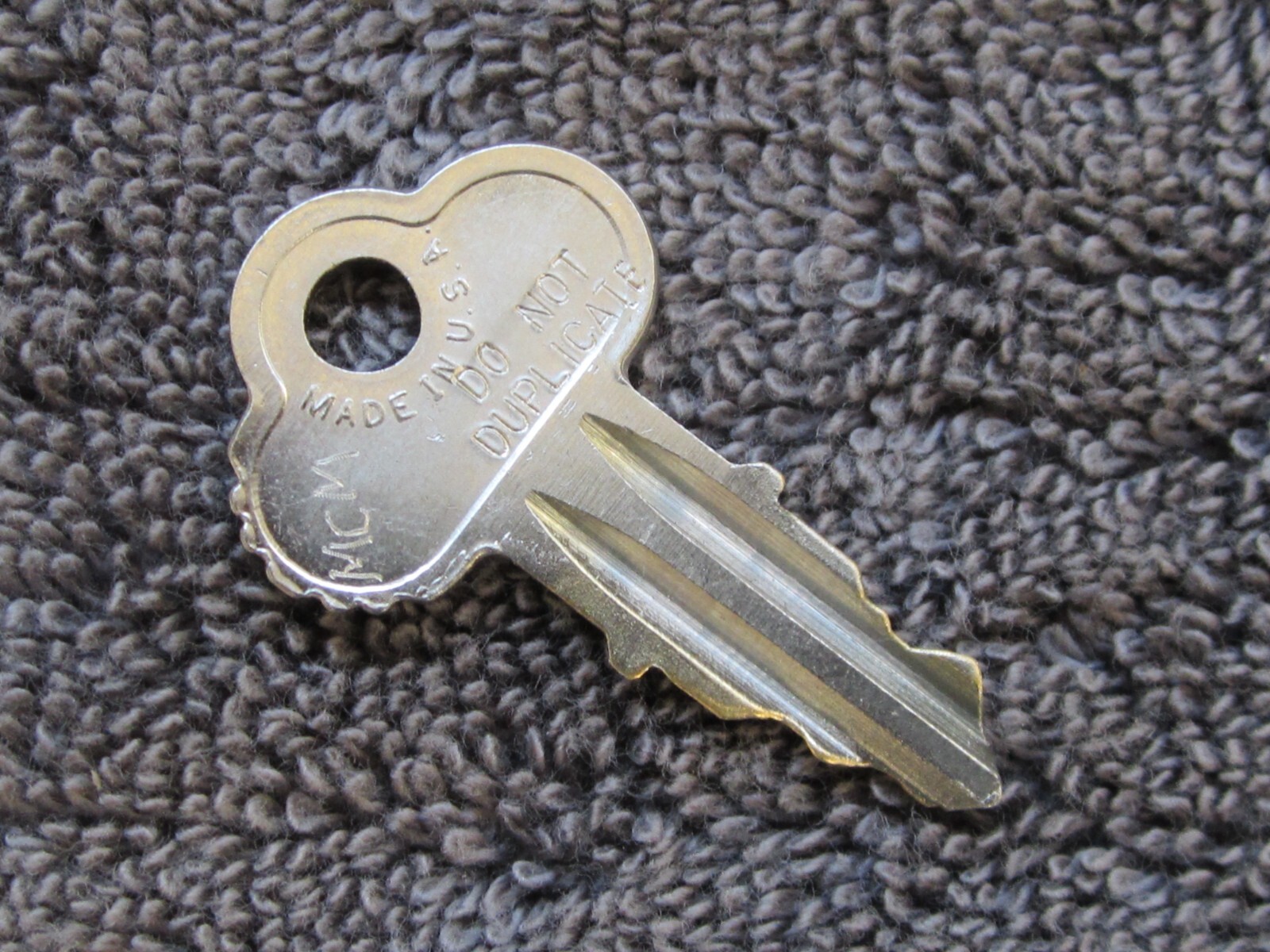 Top key for Parking meters with a lock that is stamped MCM