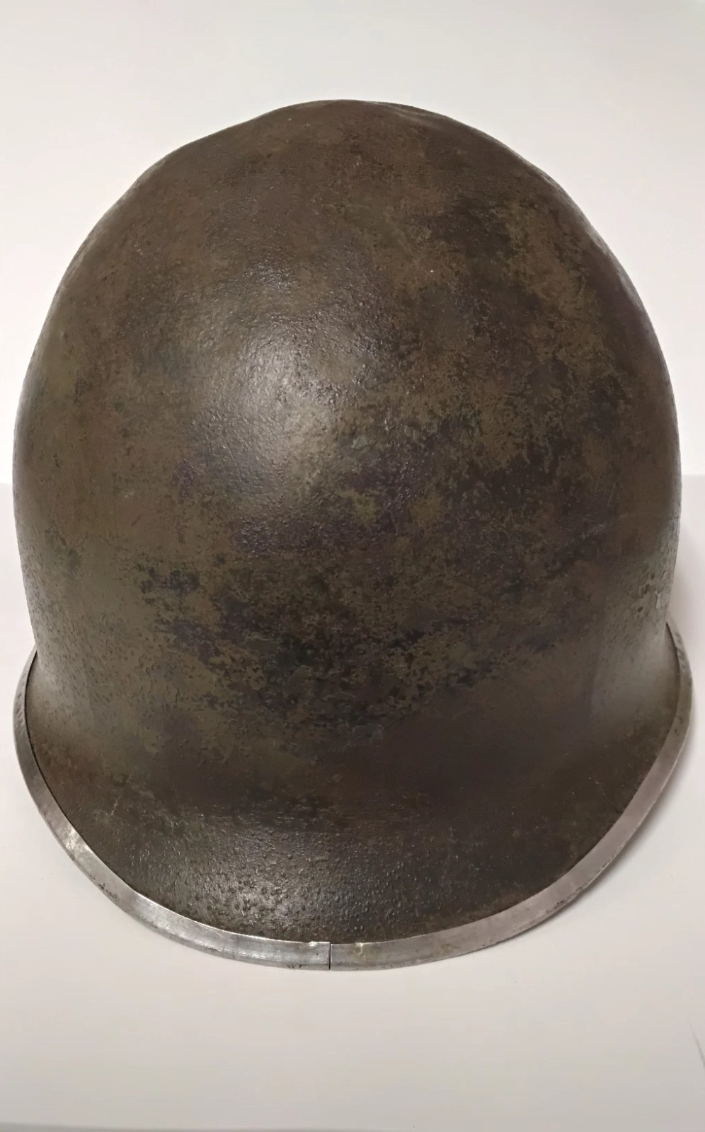 The object in the image is a U.S. M1 combat helmet shell