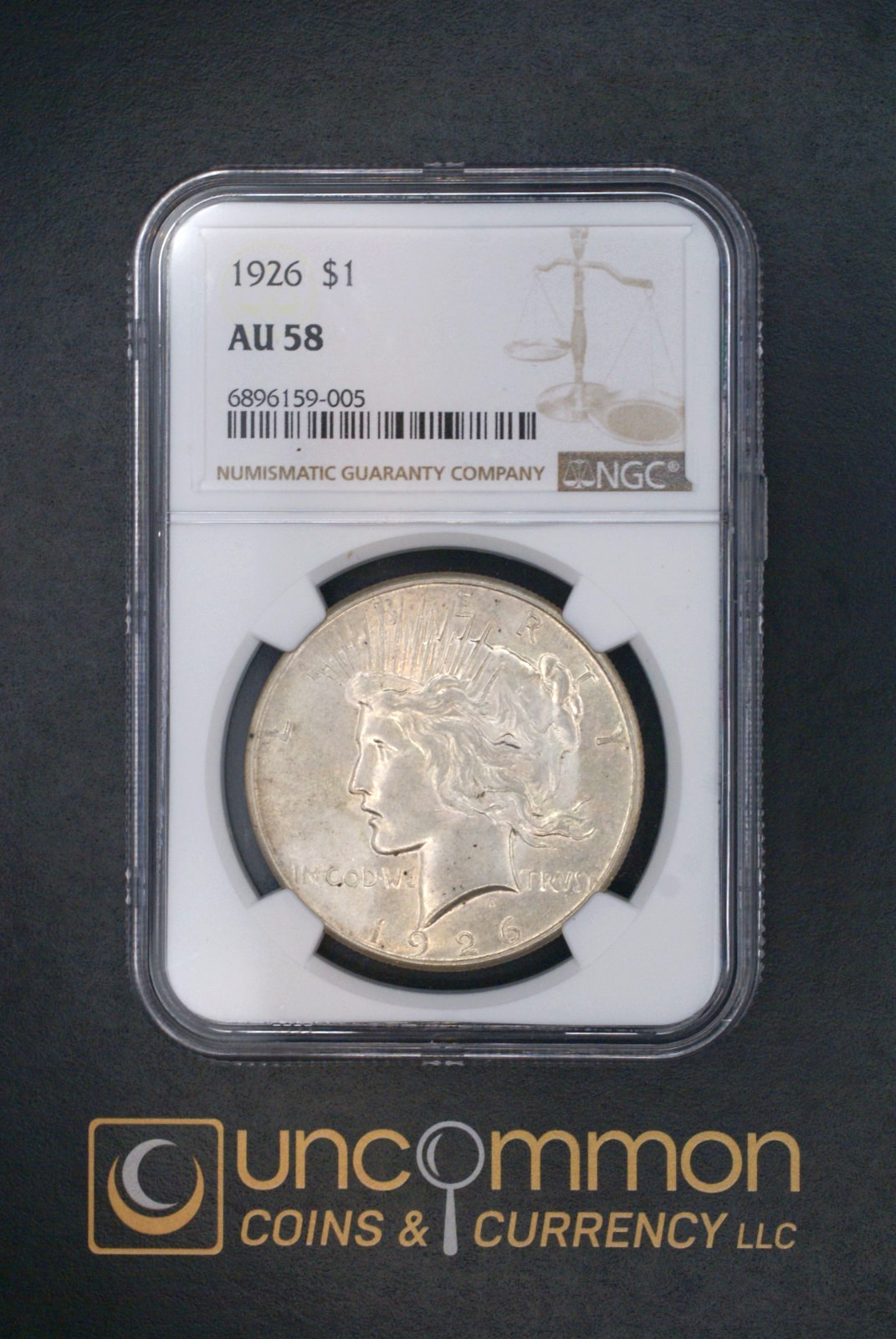 1926  PEACE DOLLAR  NGC graded at AU58.  (UCC-PSD-1926-AU58-N-0016)