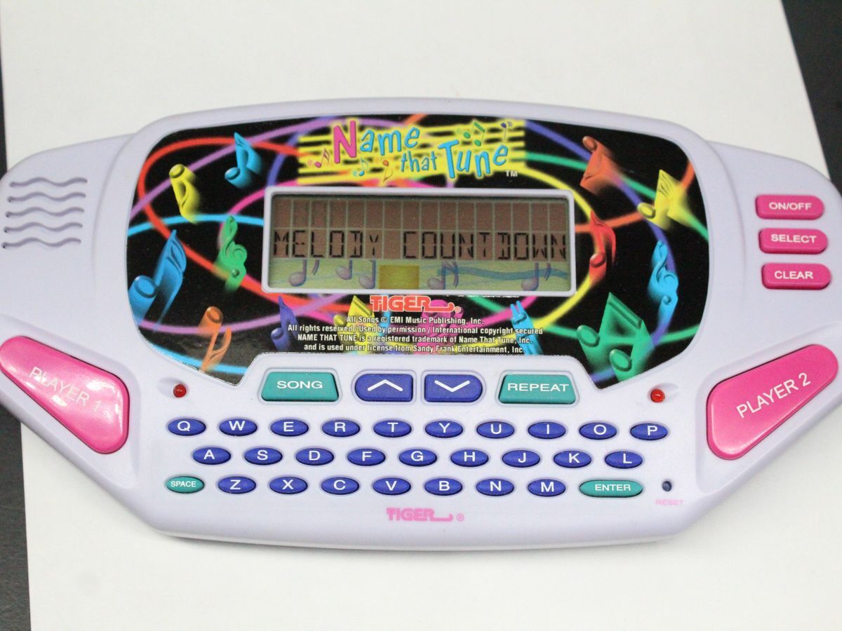 Vintage Name That Tune Hand Held Game by Tiger Electronic Game Tested