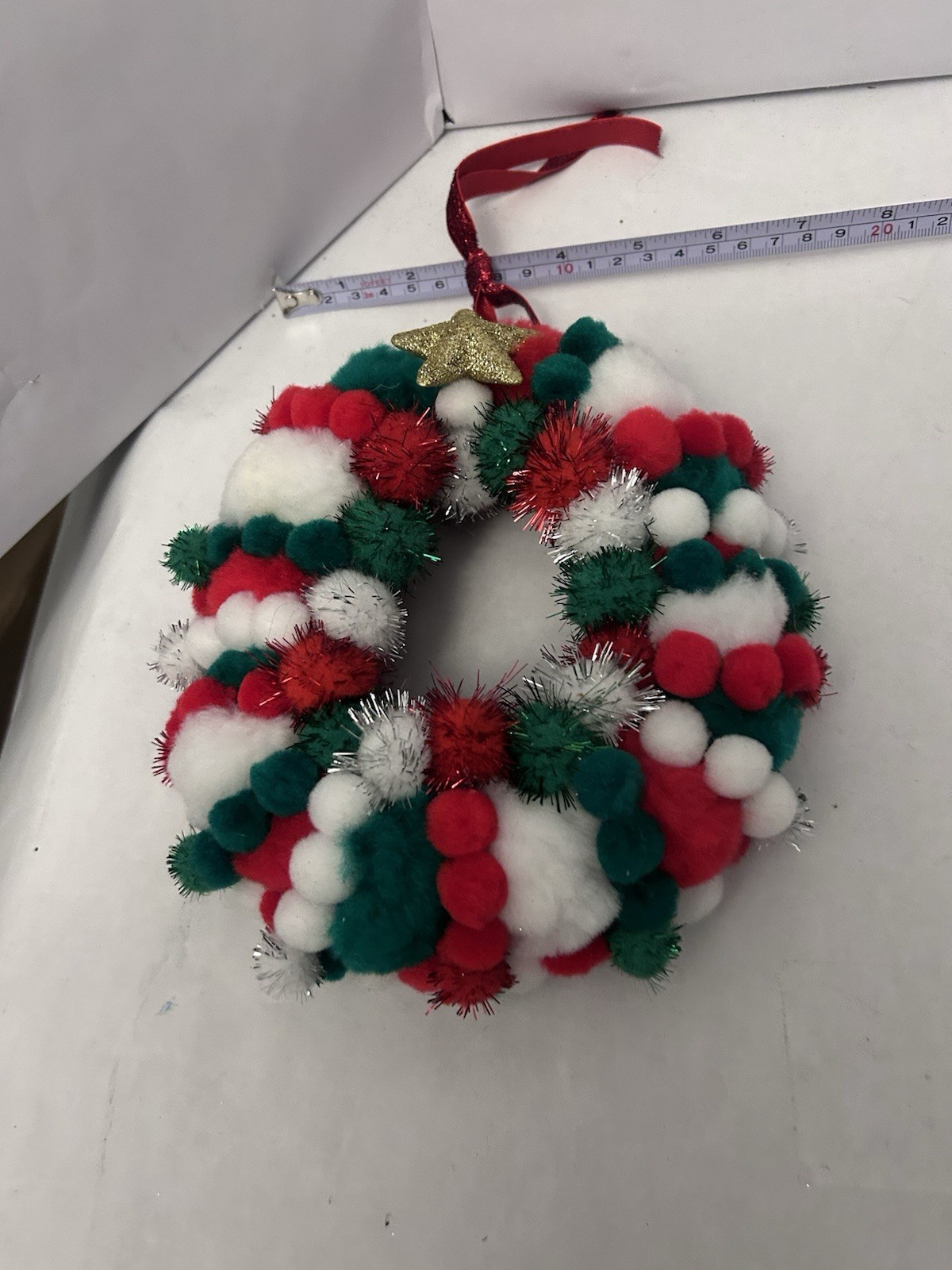 Christmas wall/door hanging decor poof balls on wooden wreath white/red/green