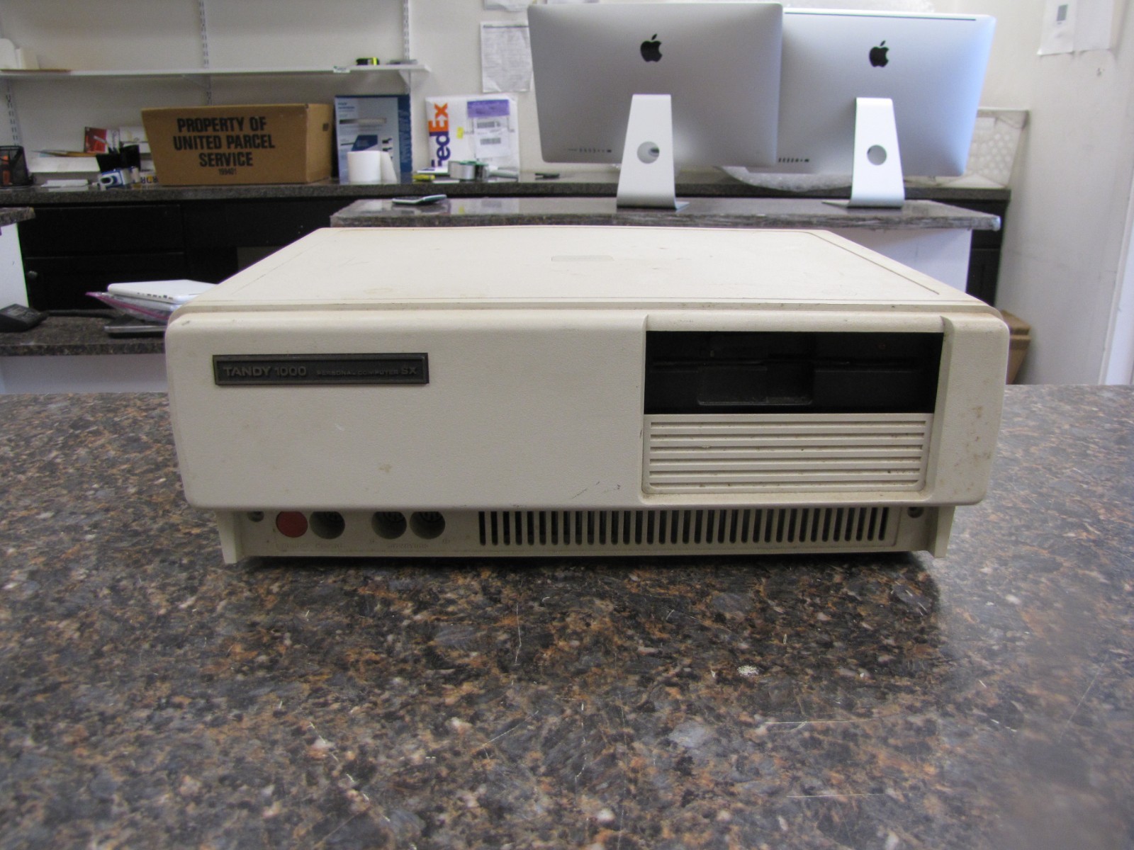 Vintage Tandy 1000 SX Model No. 25-1052B - powers on and displays garbage