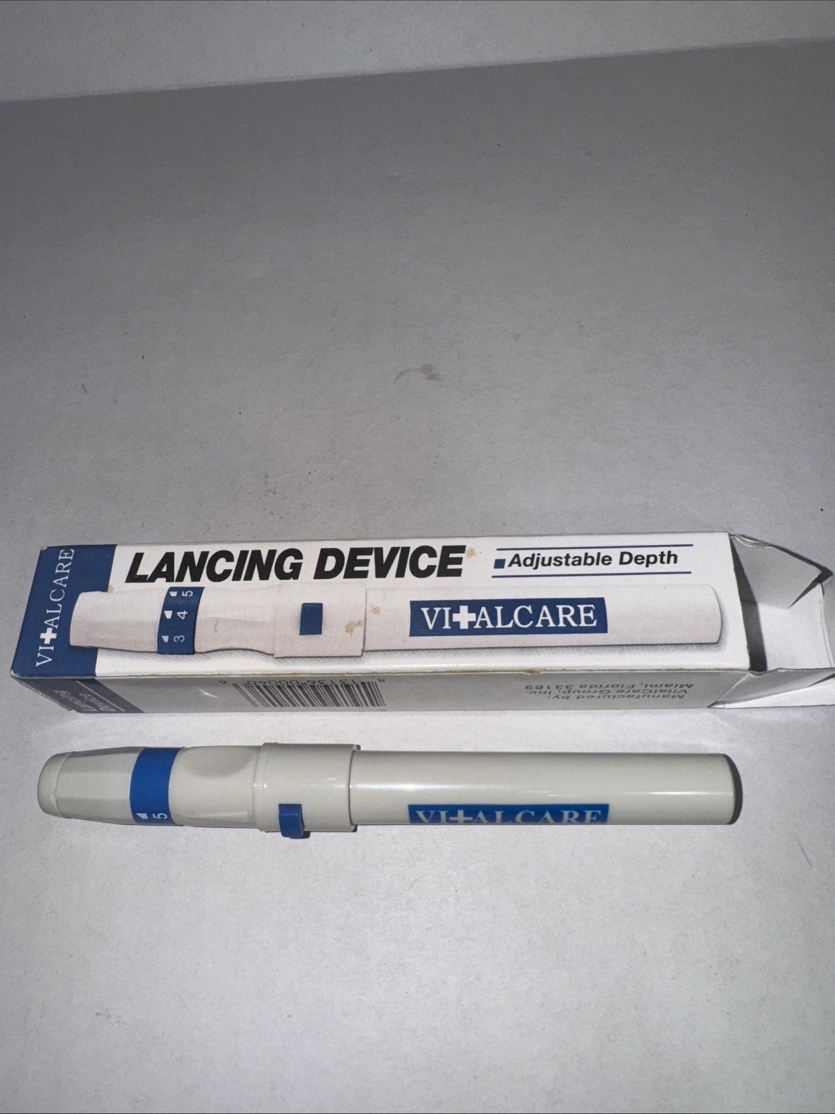 Vital Care Lancing Device With Adjustable Depth