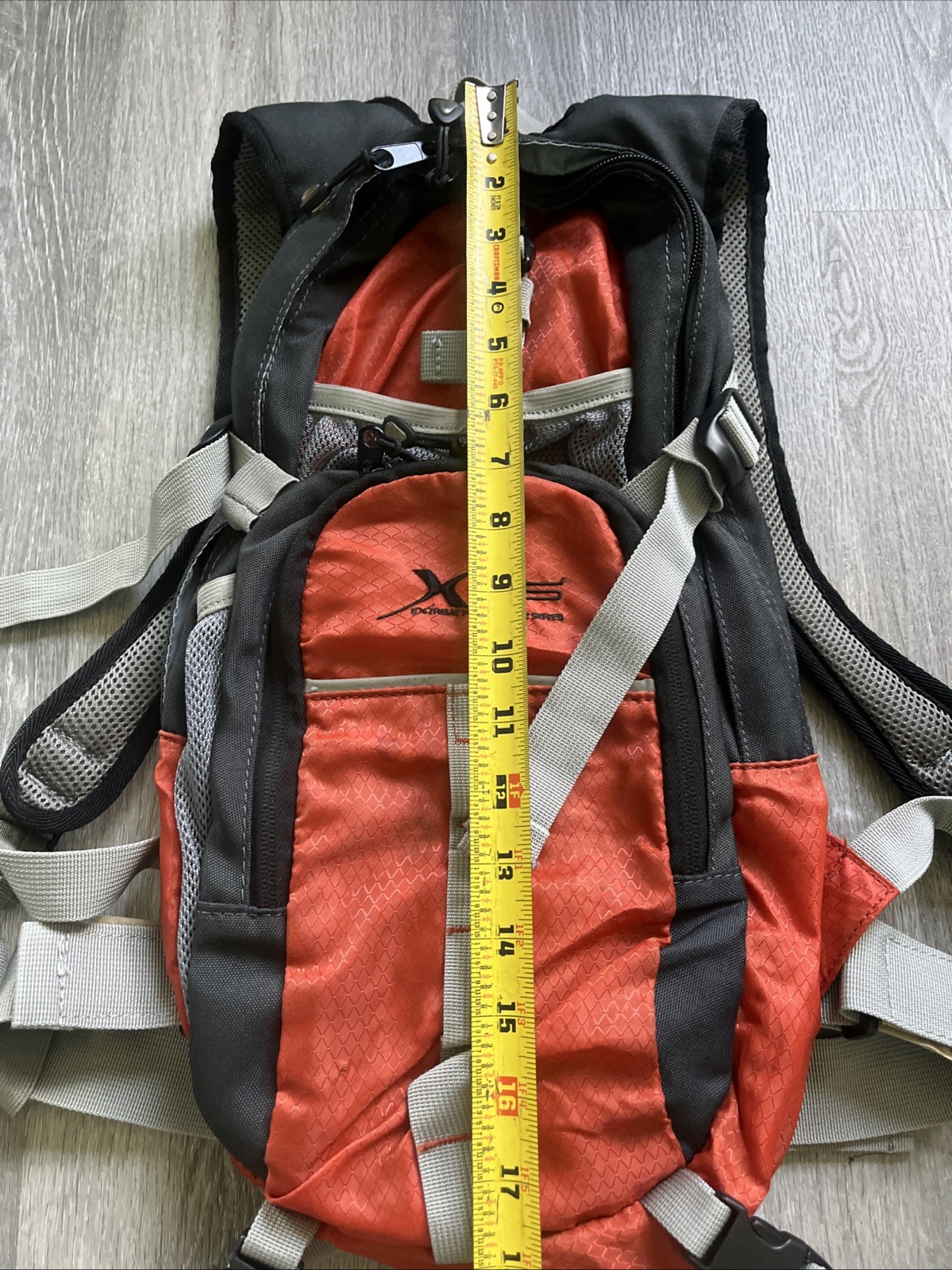 Bass Pro Shops XPS 2 L 68 Oz Rip-Stop Hydration Backpack + Bladder ORANGE BLACK