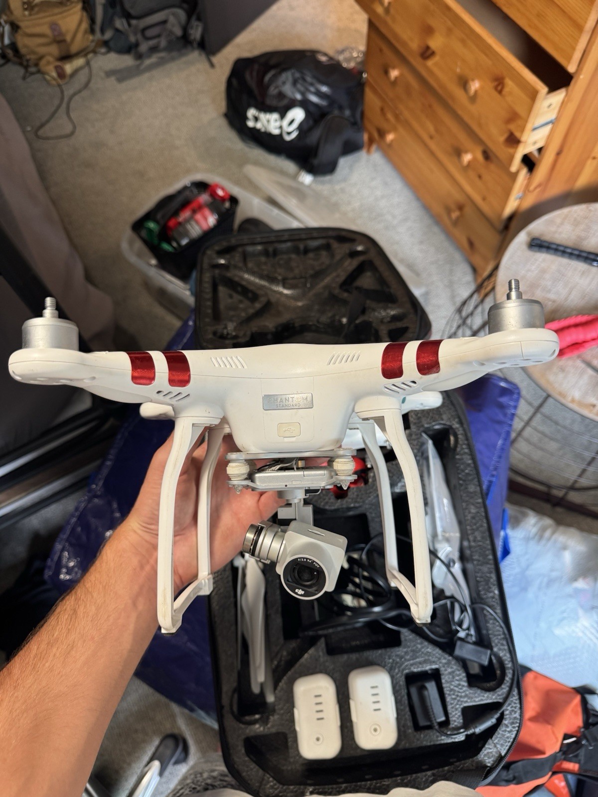 DJI Phantom 3 Standard with 3 batteries, extra propellers, and protective case