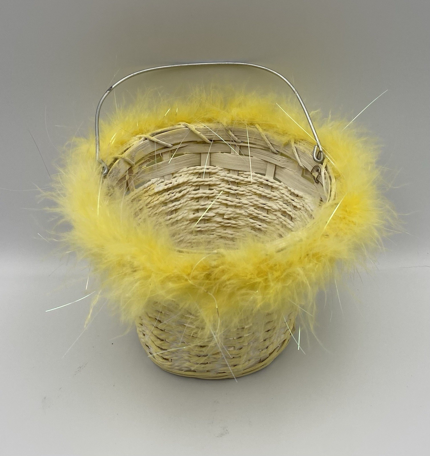 Woven Wicker Yellow Easter Basket With Fluffy Yellow Feather Trim Wire Handle