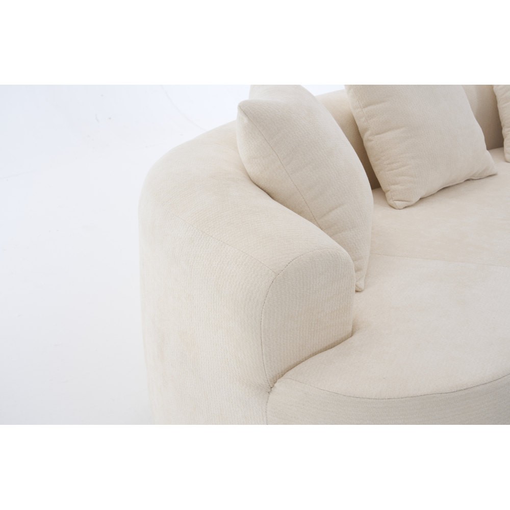 Crescent-shaped sofa, modern low-back design with deep cushions, self-inflating
