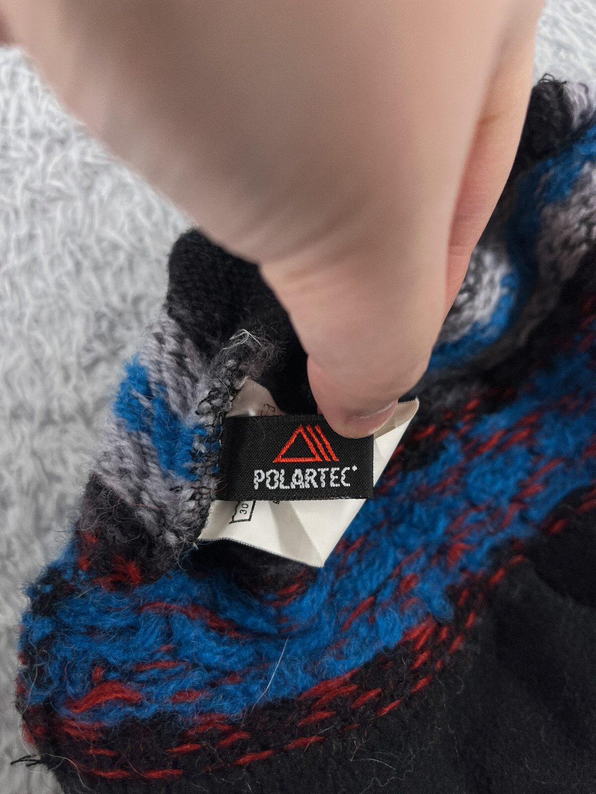 Merkley Beanie Toque Adult One Size Black Geometric Wool Poly Tassel Polartec