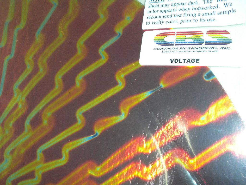 Dichroic Glass:CBS 90 COE Voltage Pattern: Candy Apple Red on Flat Black - 3"Sq