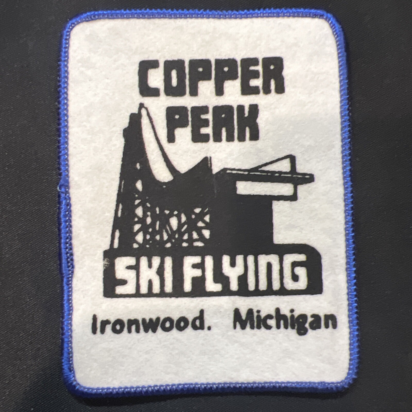 Vintage Skiing Michigan Ski Flying Copper Peak Ironwood, MI Patch Border Blue😎