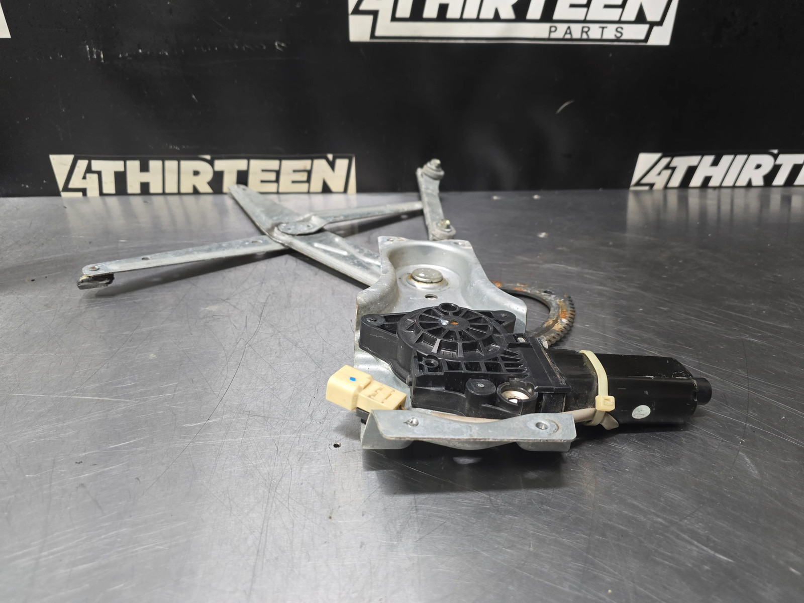 2004-06 GTO DRIVERS SIDE LH WINDOW REGULATOR ASSEMBLY W/ MOTOR - OEM #N12
