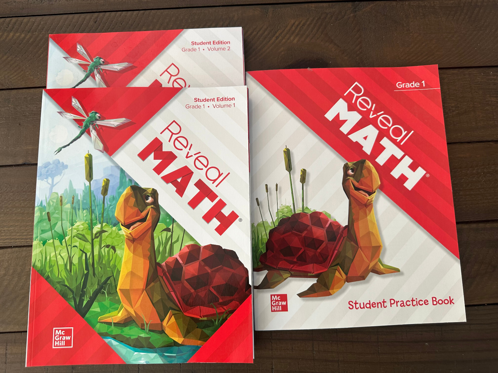 Reveal Math 1st Grade Volume 1 & 2 and workbook NEW 3 books McGraw Hill