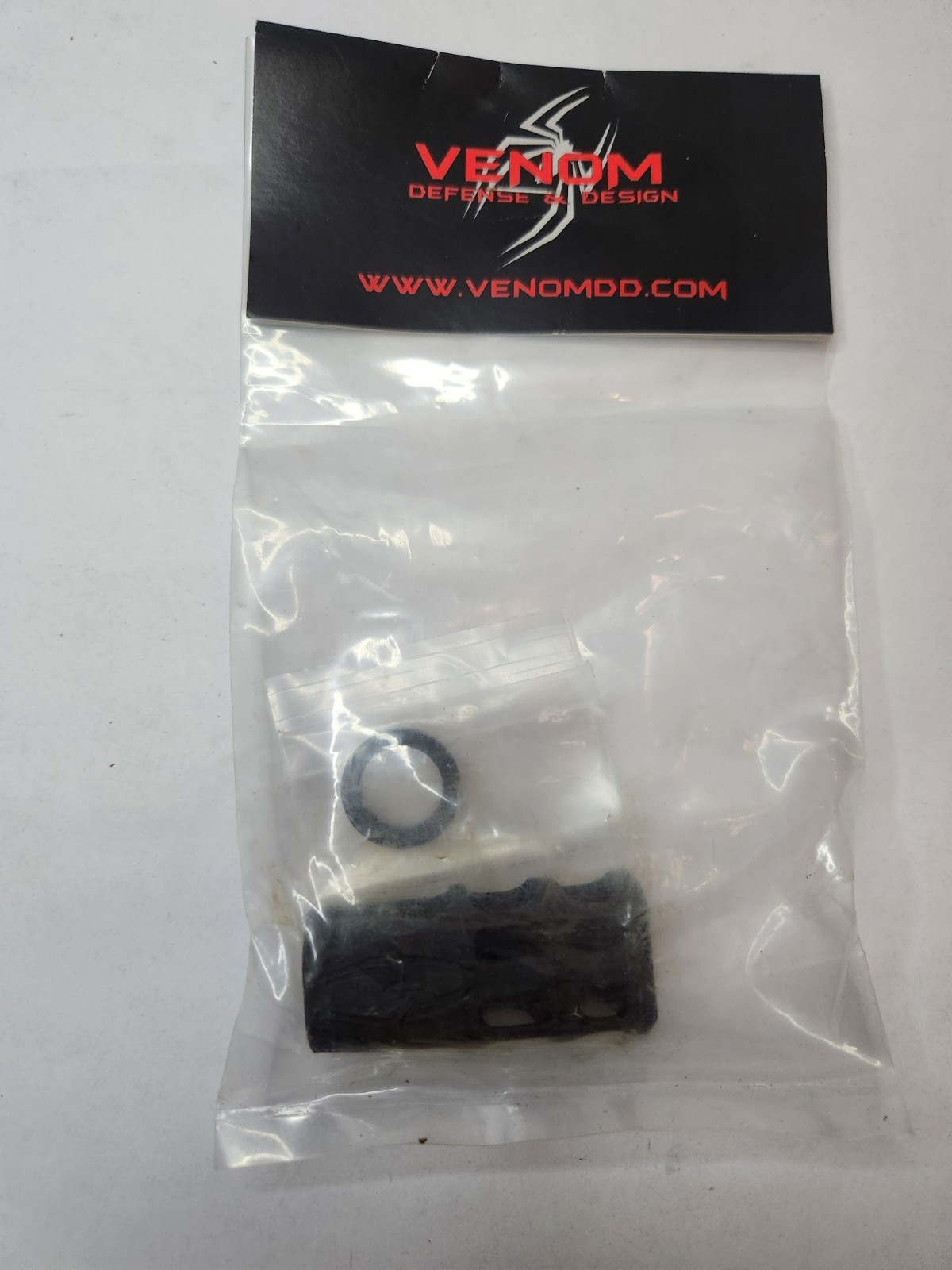 Muzzle brake/compensator.   Venom Defense